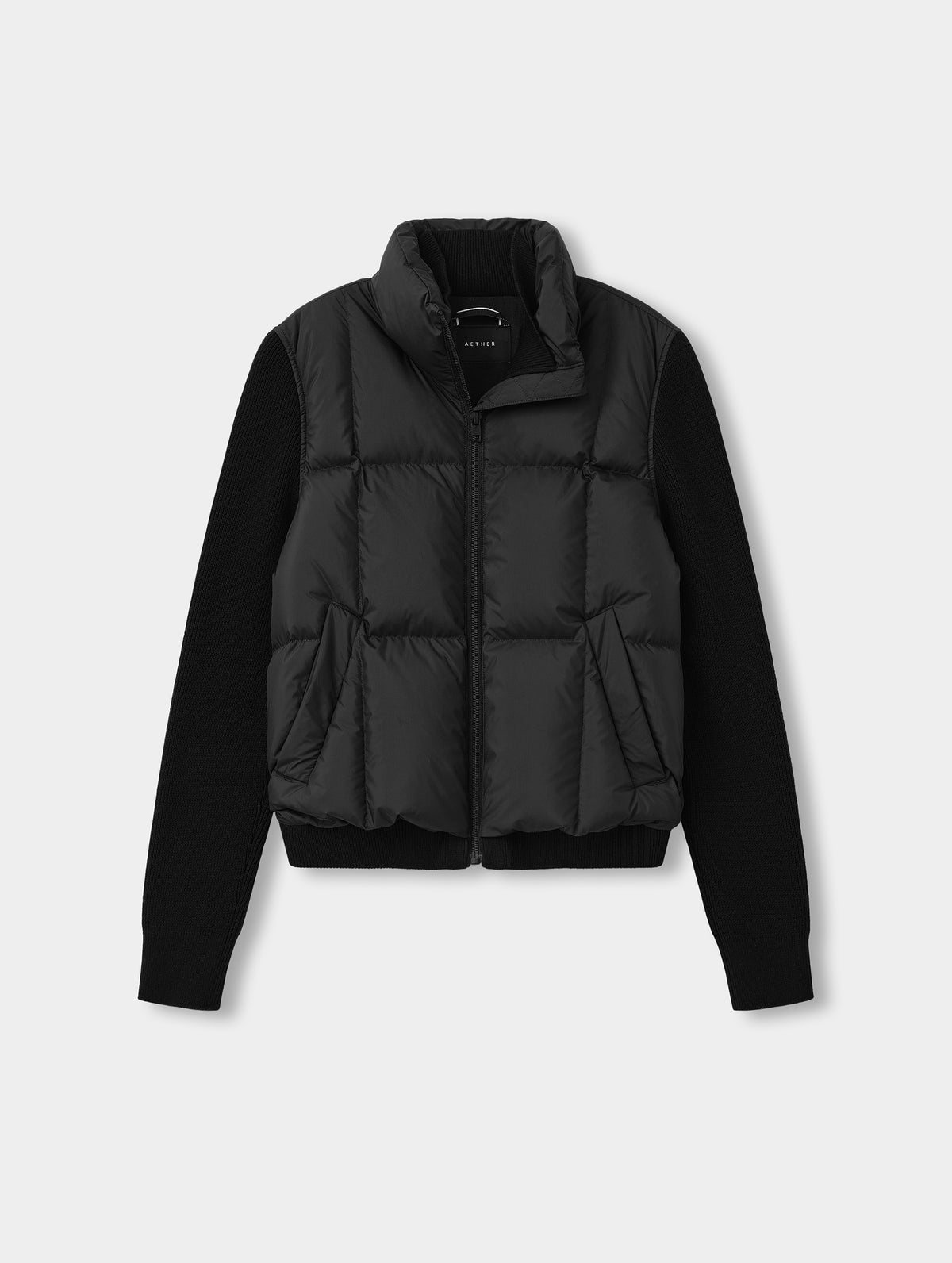 Flat lay view of the the Nina Sweater Jacket 2.0 in Onyx Black from AETHER Apparel.