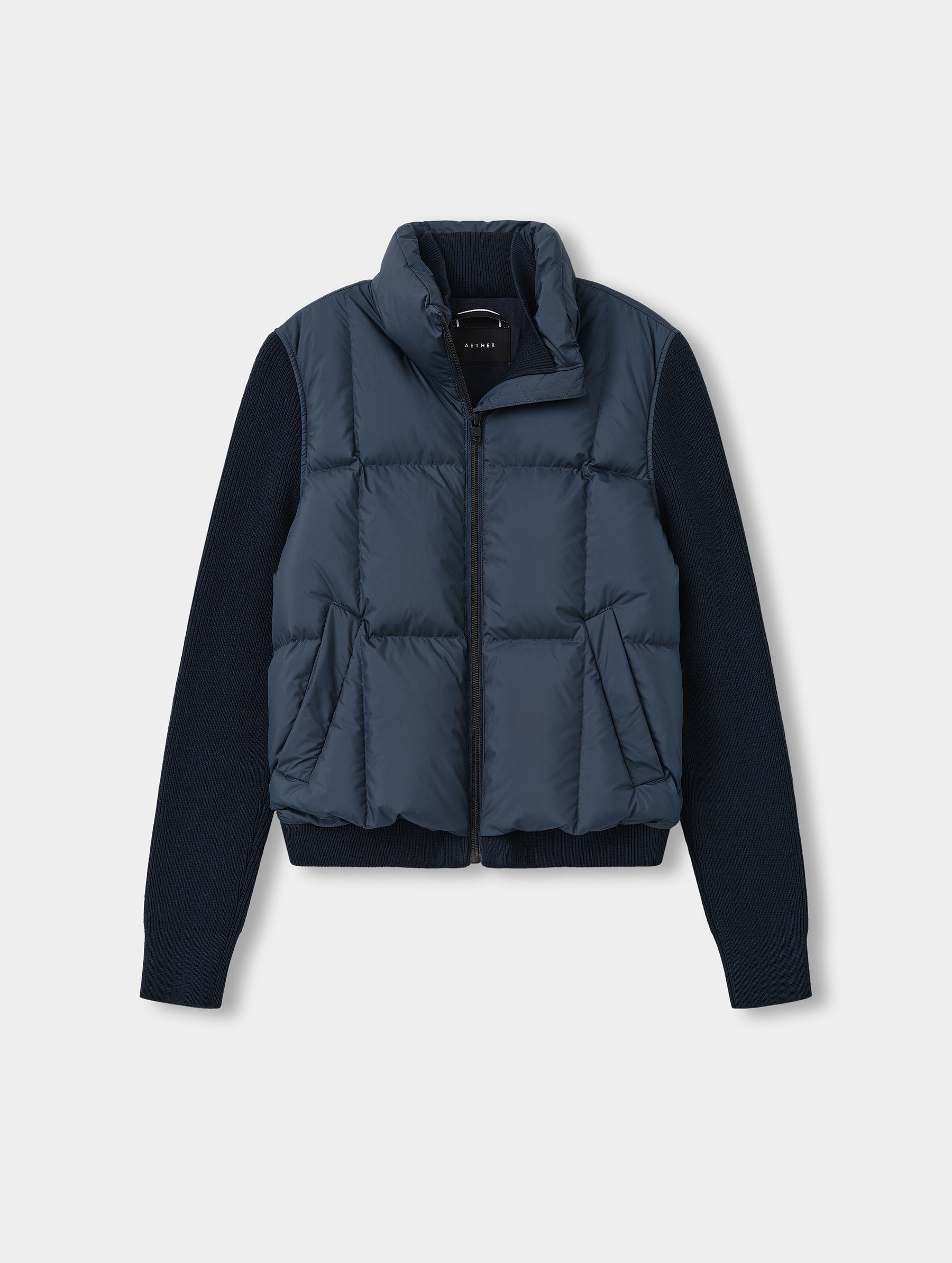 Flat lay view of the Nina Sweater Jacket 2.0 in Total Eclipse from AETHER Apparel.