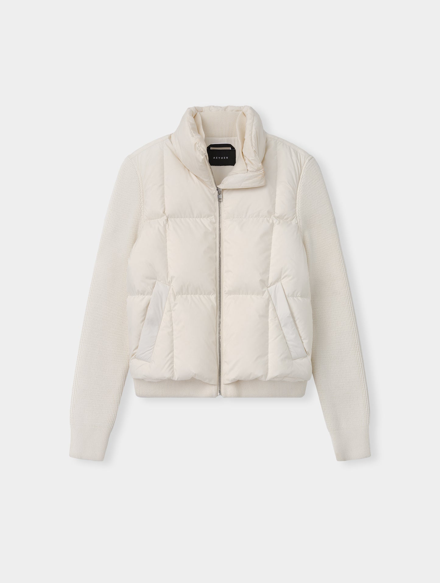 Flat lay view of the the Nina Sweater Jacket 2.0 in Winter White from AETHER Apparel.