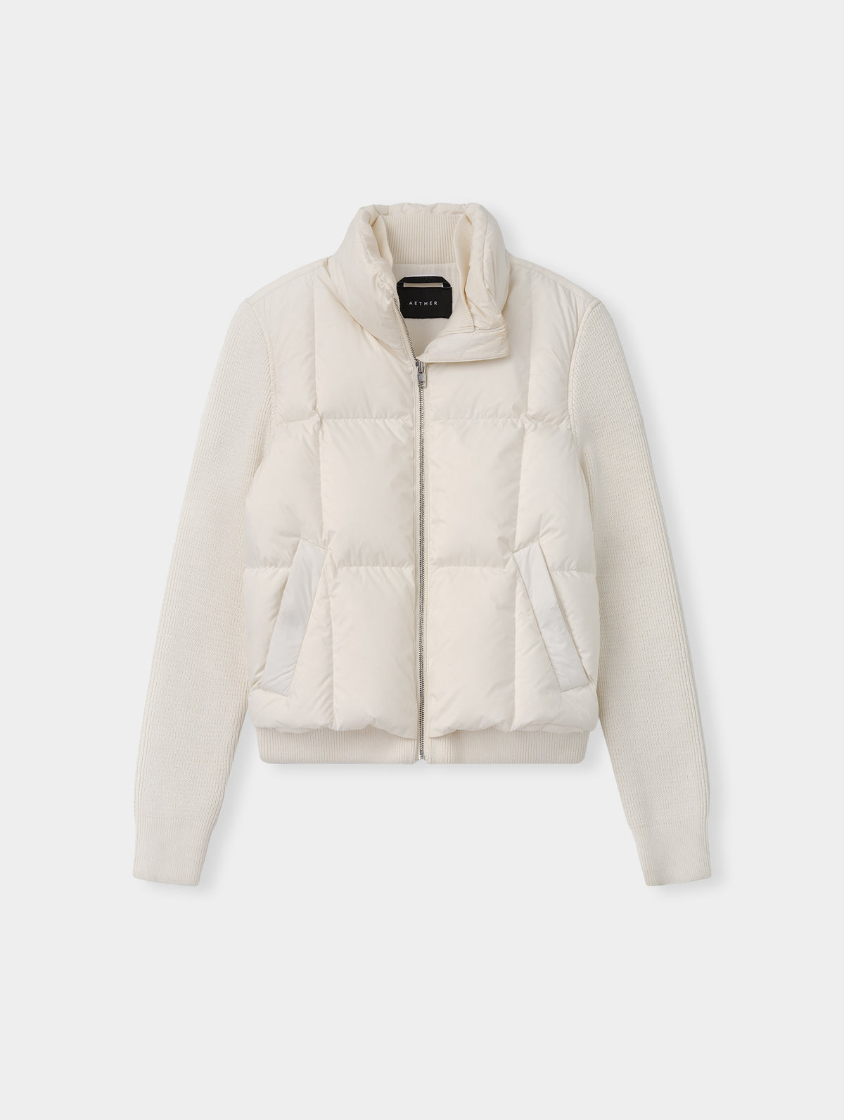 Flat lay view of the the Nina Sweater Jacket 2.0 in Winter White from AETHER Apparel.