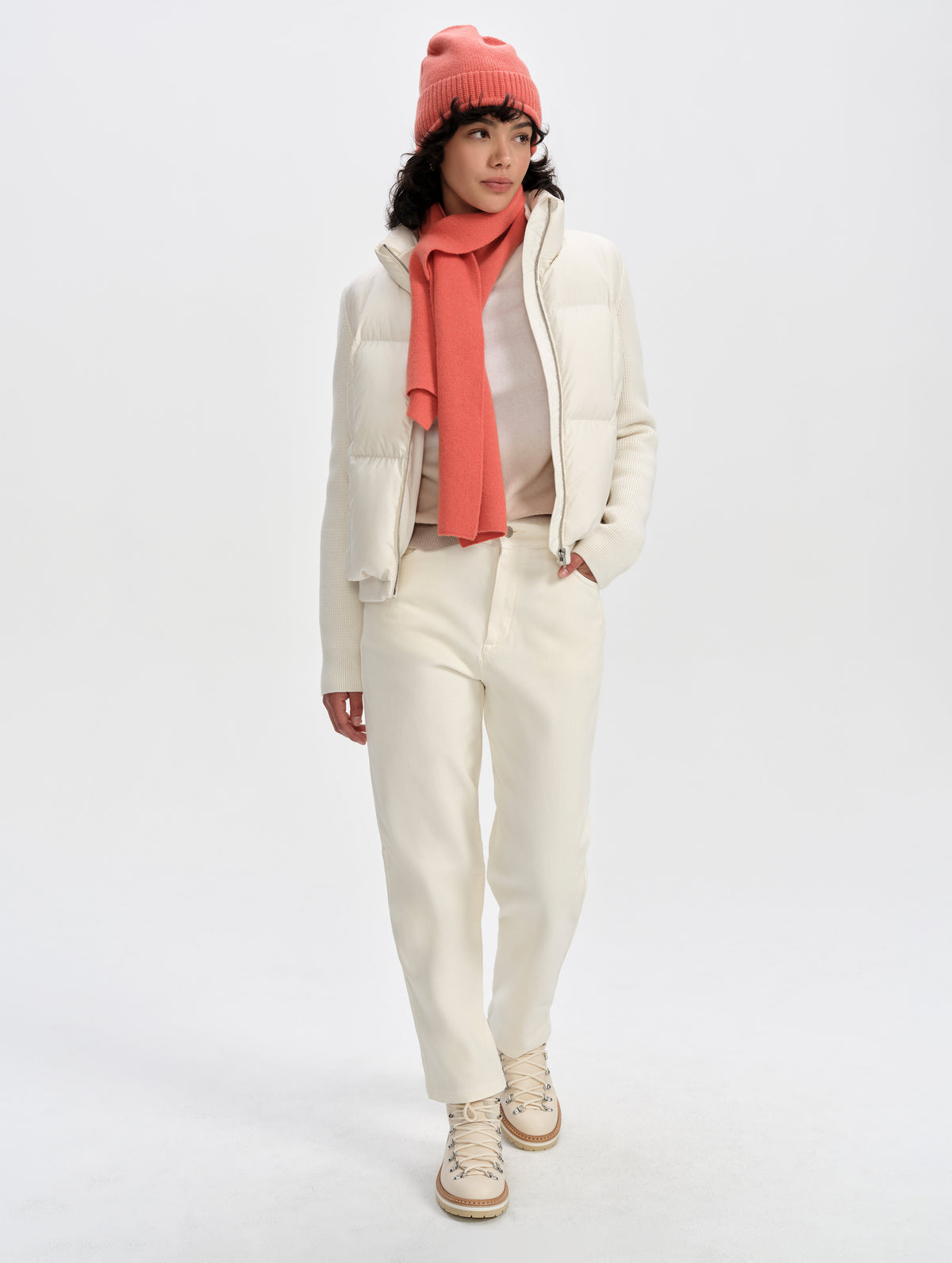 Front full-body view of woman wearing the Nina Sweater Jacket 2.0 in Winter White from AETHER Apparel.