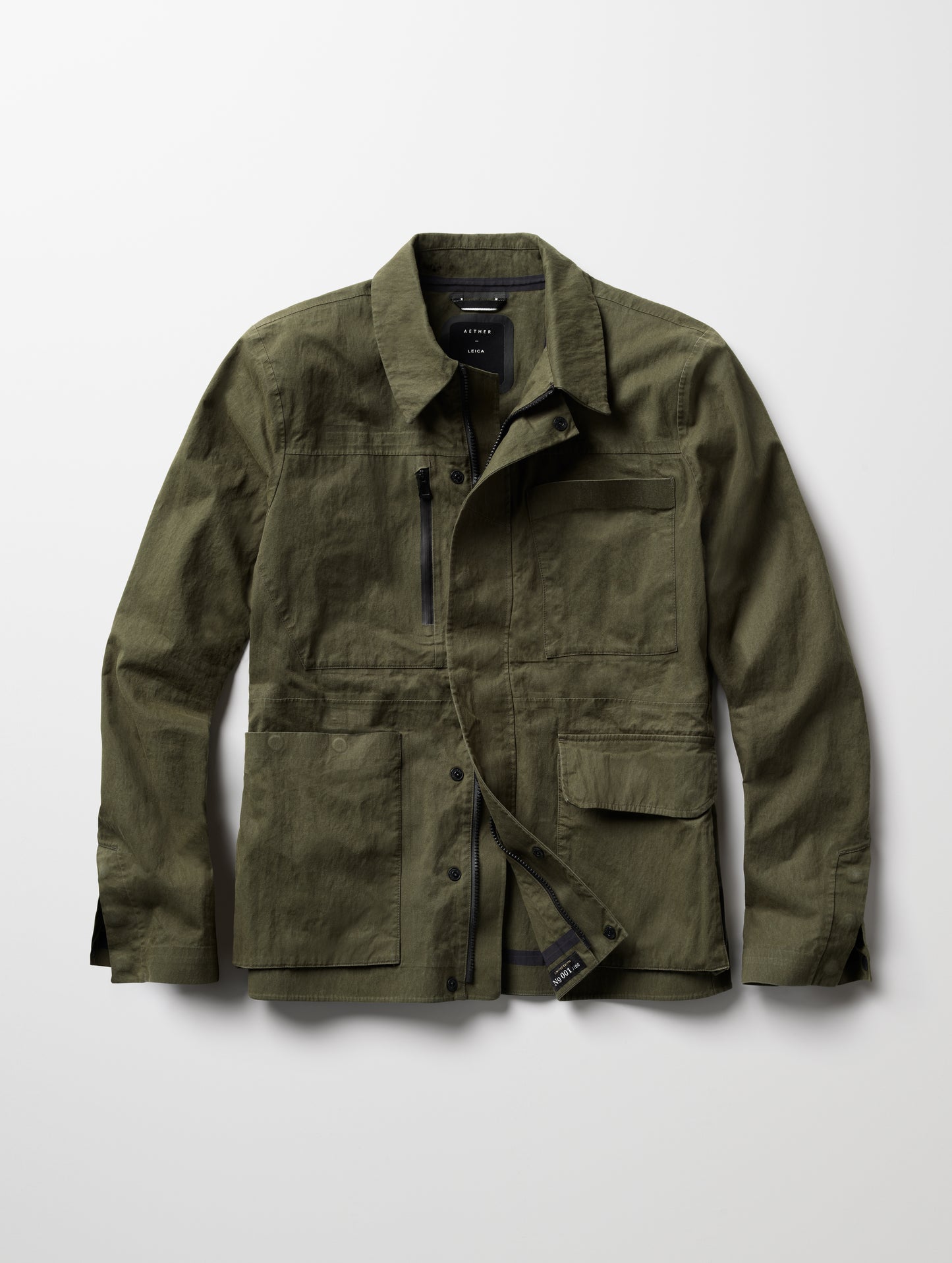 Isolated view of green Reporter Jacket from AETHER Apparel.