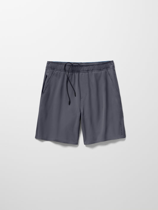 Flay lay image of Rogue Hybrid Short in Graphite from AETHER Apparel.