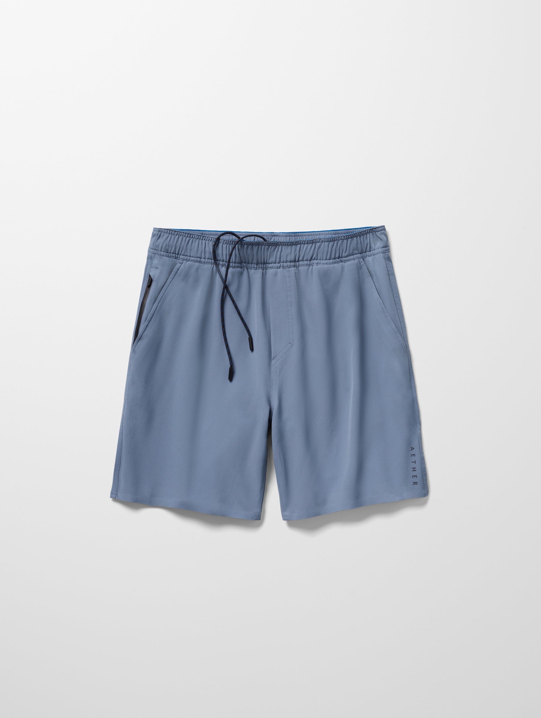 Flay lay image of Rogue Hybrid Short in Portal Blue from AETHER Apparel.