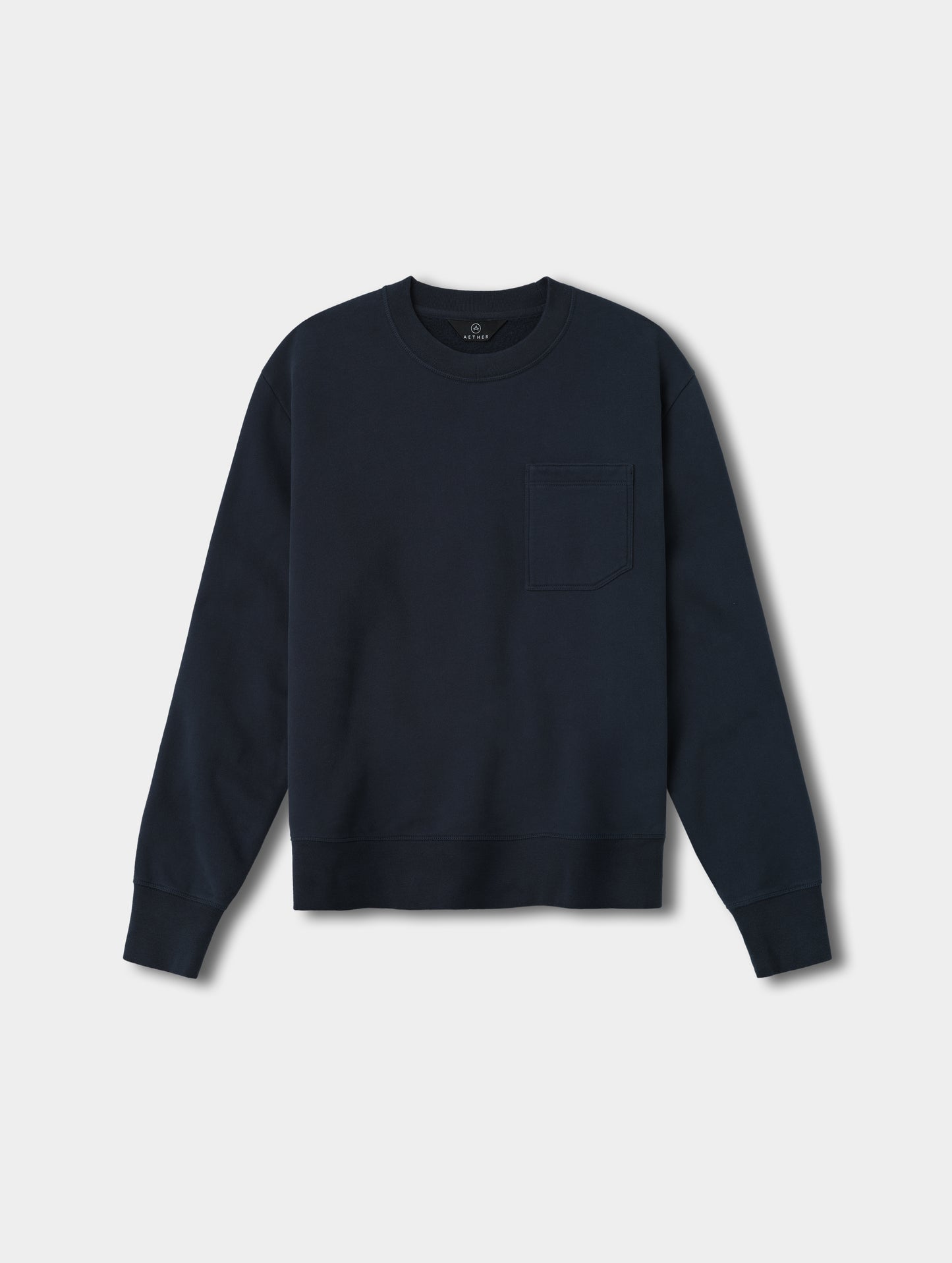 Flat lay view of the Rylan Crewneck Sweatshirt in Total Eclipse from AETHER Apparel.