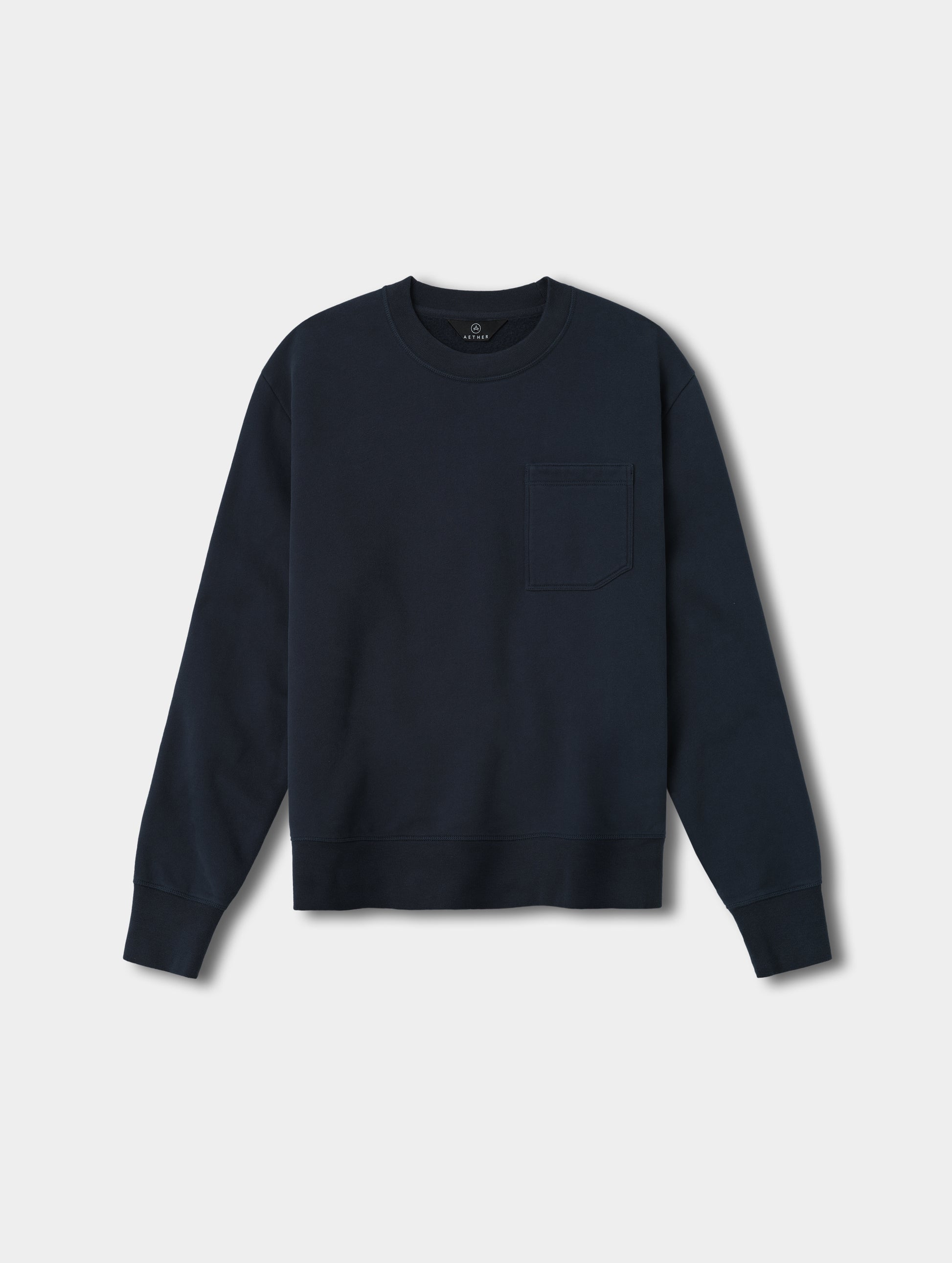 Flat lay view of the Rylan Crewneck Sweatshirt in Total Eclipse from AETHER Apparel.