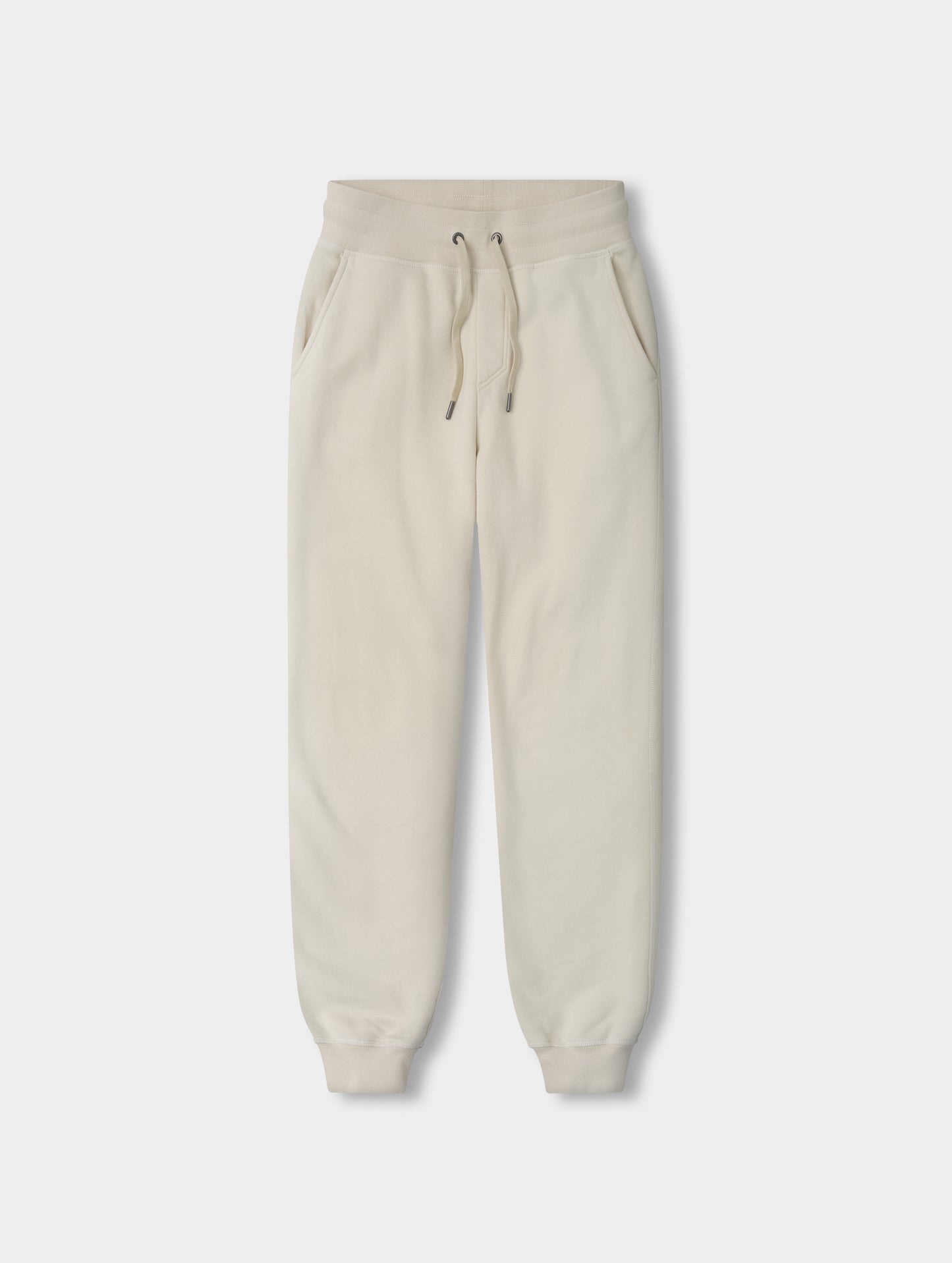Flat lay view of the Rylan Cuffed Sweatpant in Bone from AETHER Apparel.