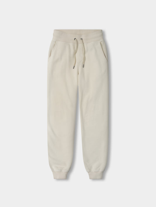 Flat lay view of the Rylan Cuffed Sweatpant in Bone from AETHER Apparel.