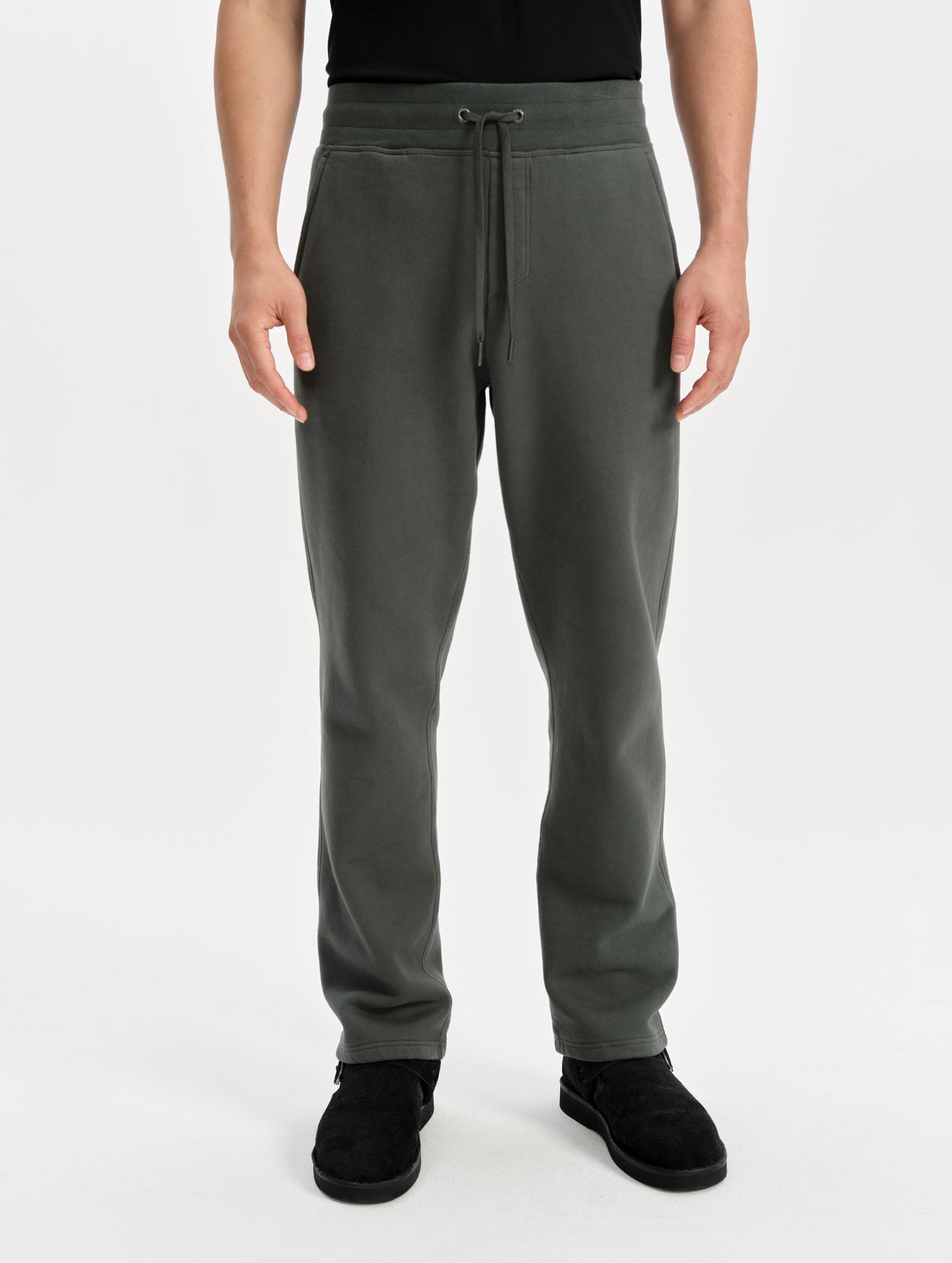 Front lower-body view of man wearing the Rylan Sweat Pant in Saville Green from AETHER Apparel. 