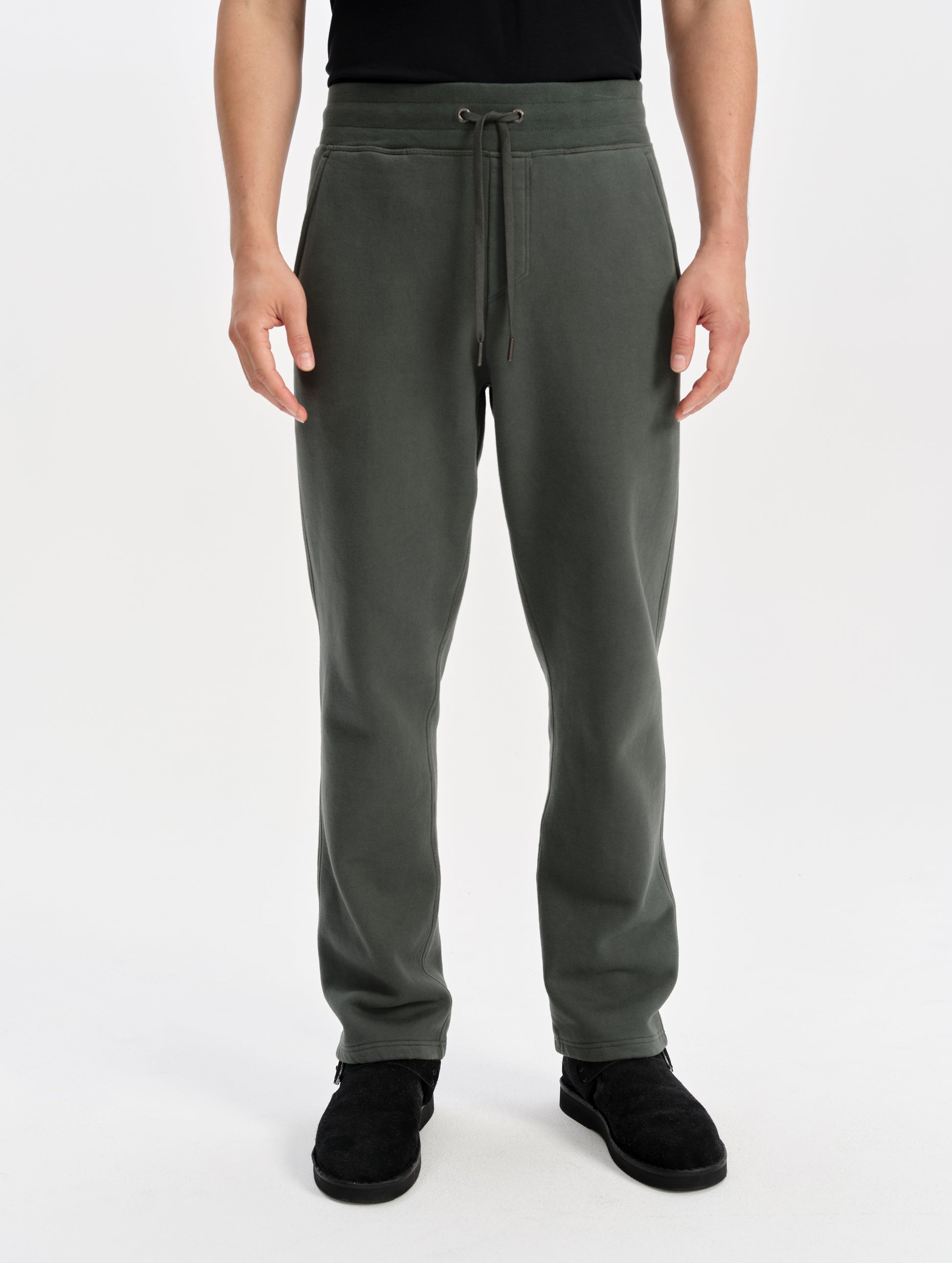 Front lower-body view of man wearing the Rylan Sweat Pant in Saville Green from AETHER Apparel. 