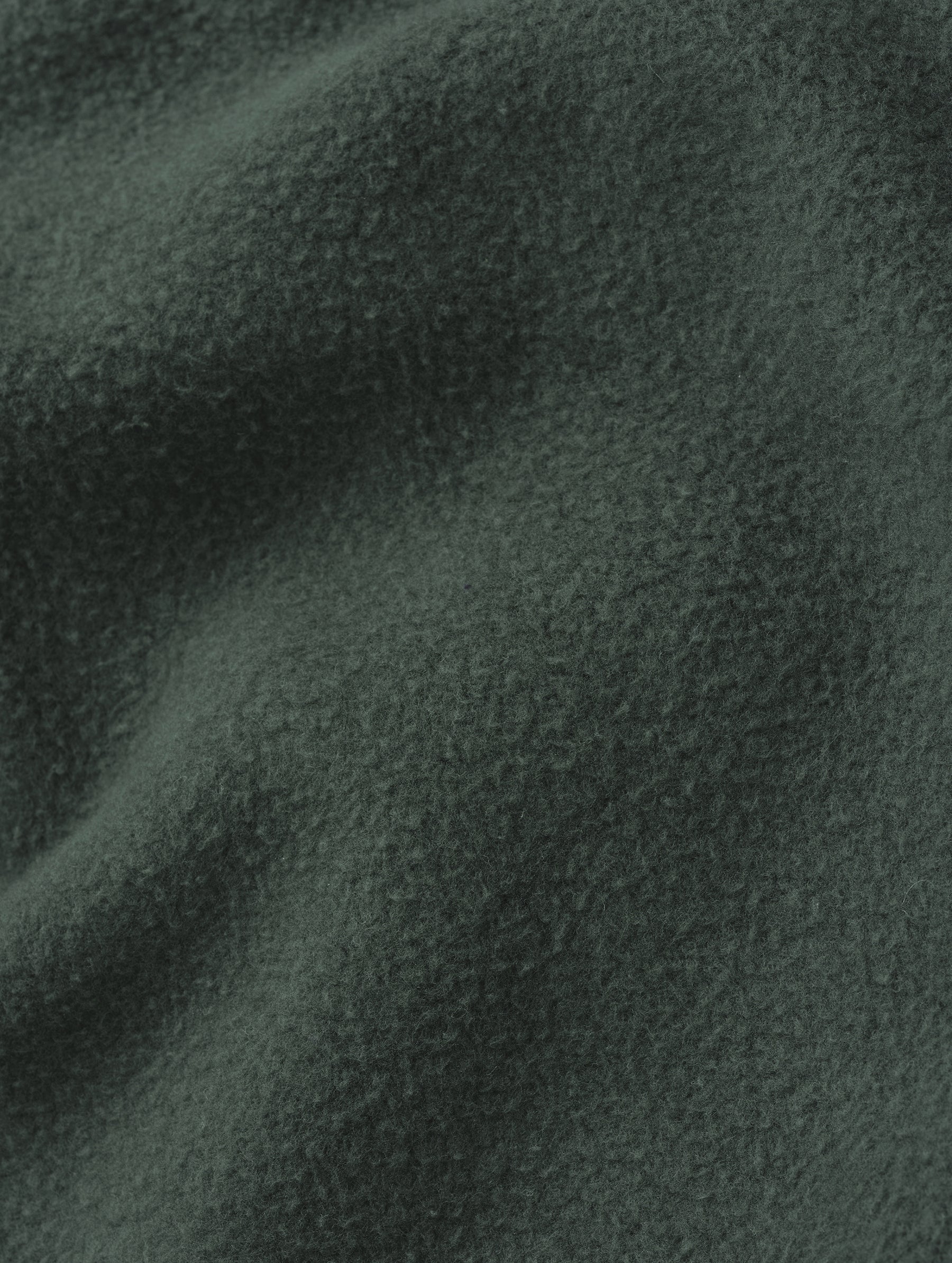 Closeup detailed view of the fabric on the Rylan Cuffed Sweatpant in Saville Green  from AETHER Apparel.