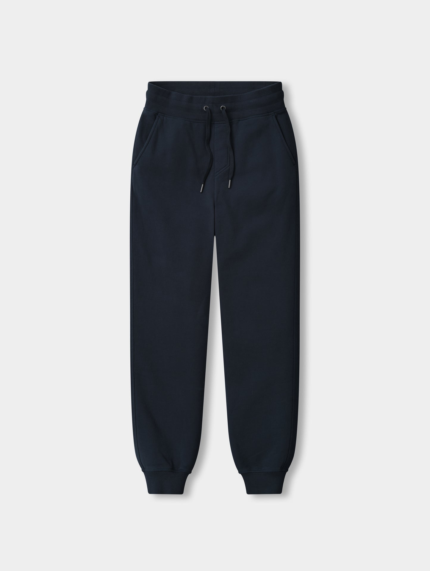 Flat lay view of the Rylan Cuffed Sweatpant in Total Eclipse from AETHER Apparel.