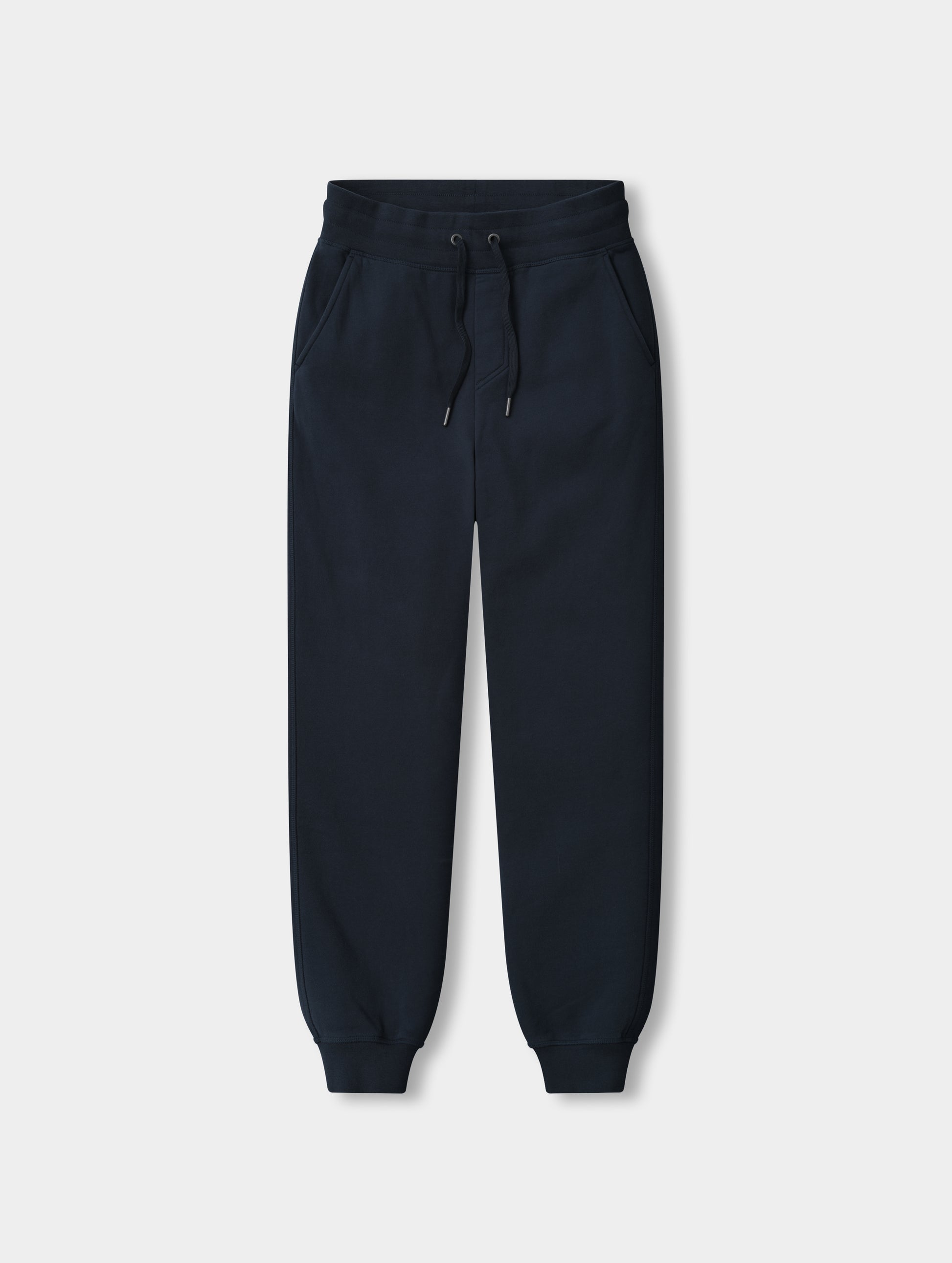 Flat lay view of the Rylan Cuffed Sweatpant in Total Eclipse from AETHER Apparel.