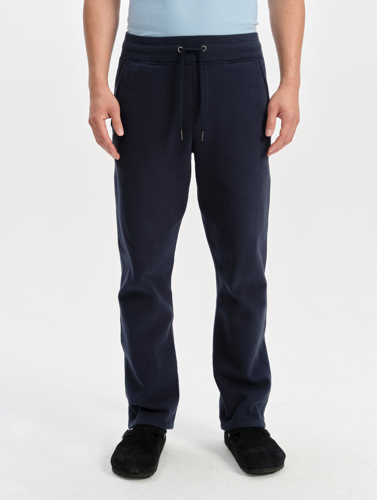 Front lower-body view of man wearing the Rylan Sweat Pant in Total Eclipse from AETHER Apparel. 