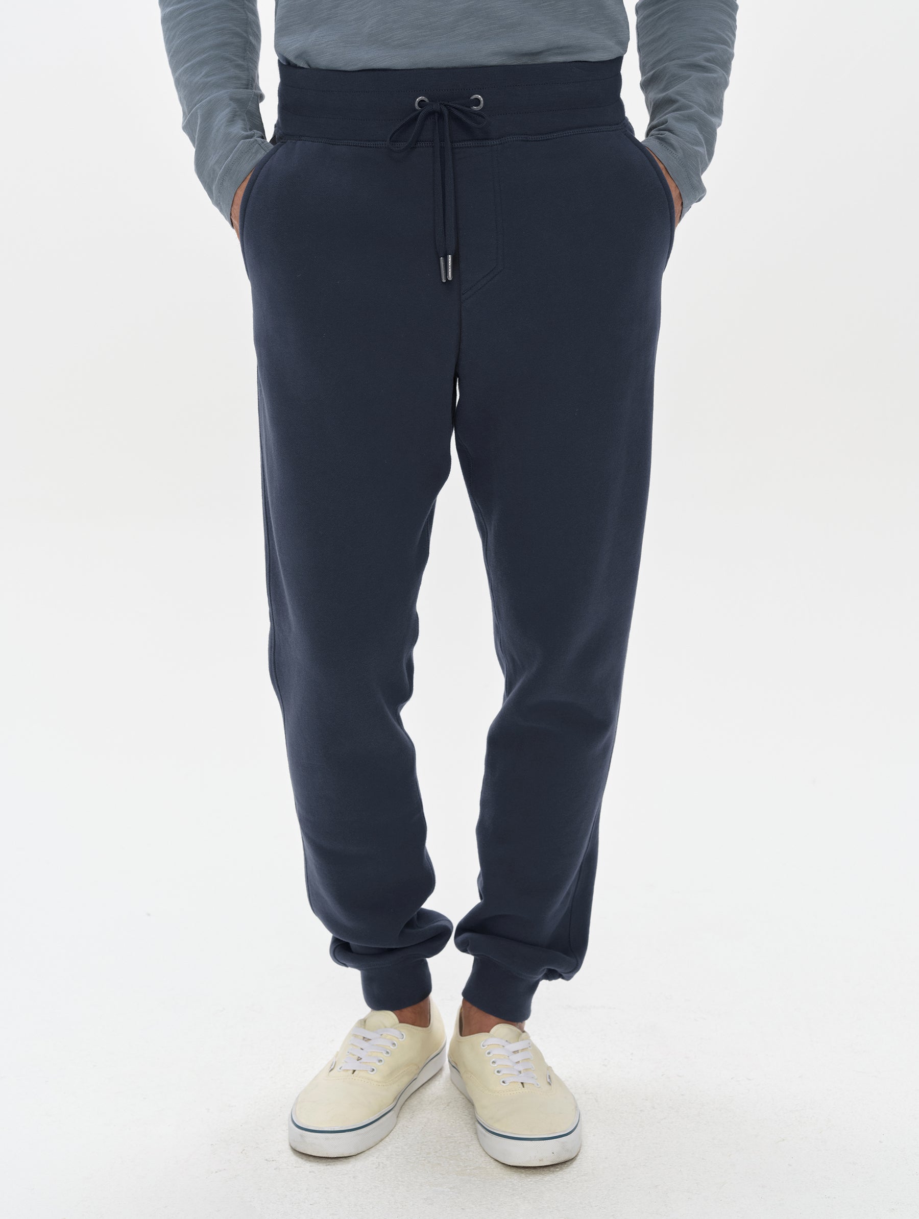 Front, lower-body view of man wearing the Rylan Cuffed Sweatpant in Total Eclipse from AETHER Apparel.
