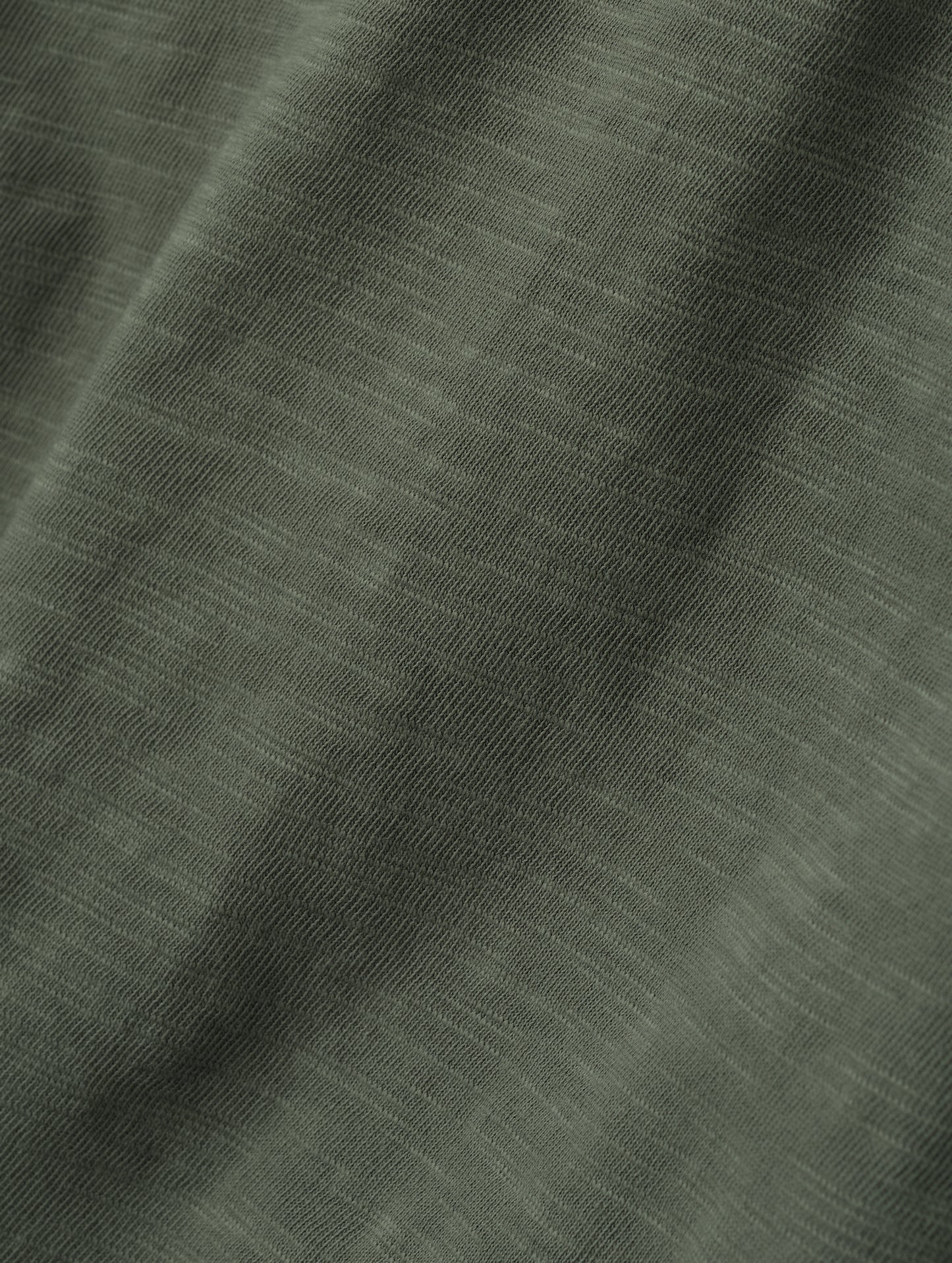 Closeup detailed view of the fabric on the Slub Pocket Long-Sleeve Tee 2.0 in Gunmetal from AETHER Apparel.