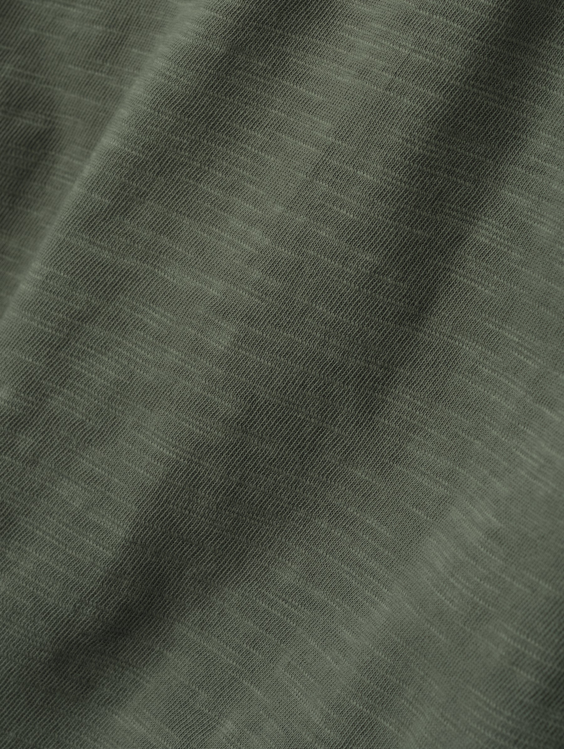 Closeup detailed view of the fabric on the Slub Pocket Long-Sleeve Tee 2.0 in Gunmetal from AETHER Apparel.