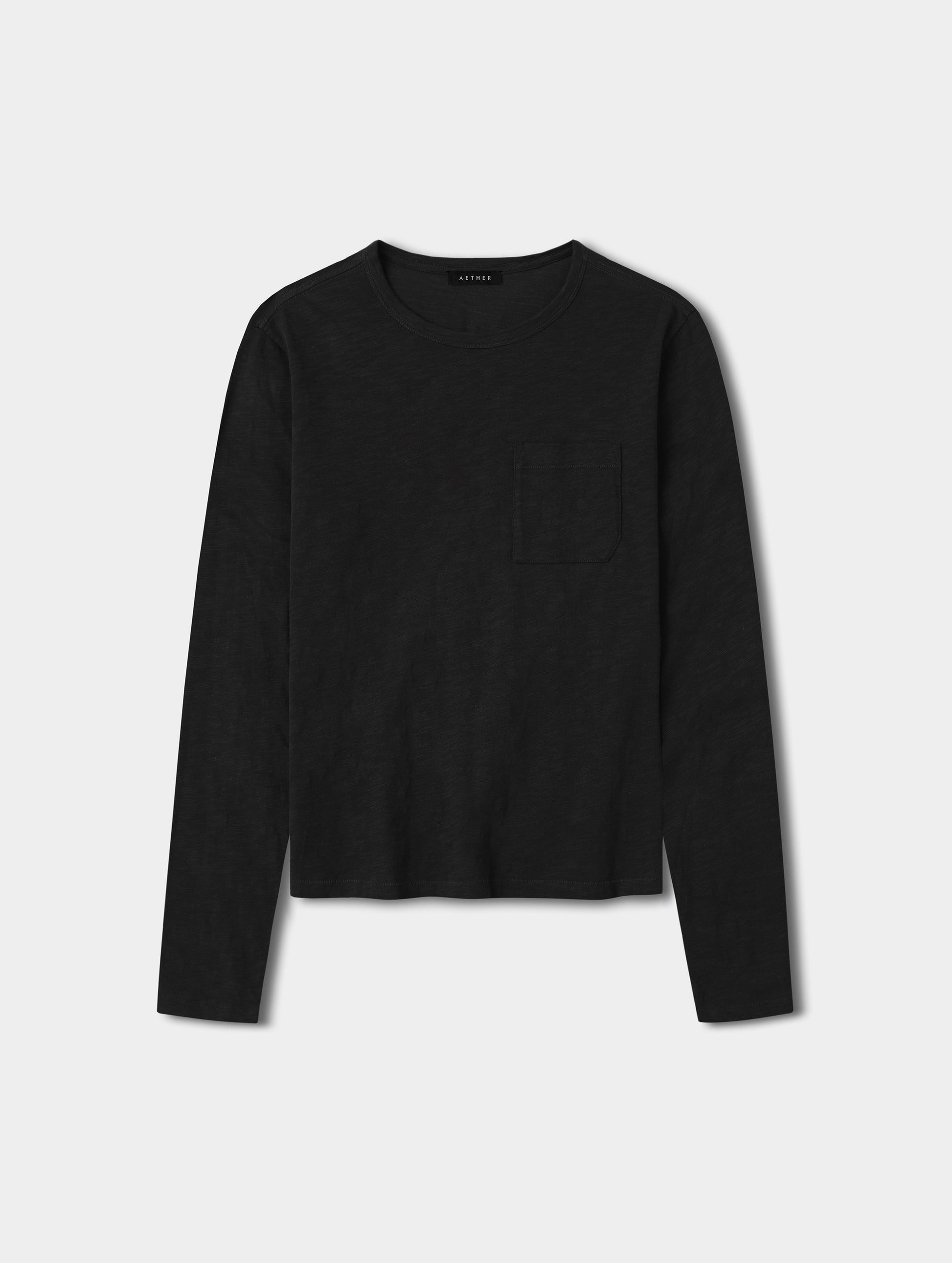 Flat lay view of the Slub Pocket Long-Sleeve Tee 2.0 in Onyx Black from AETHER Apparel.
