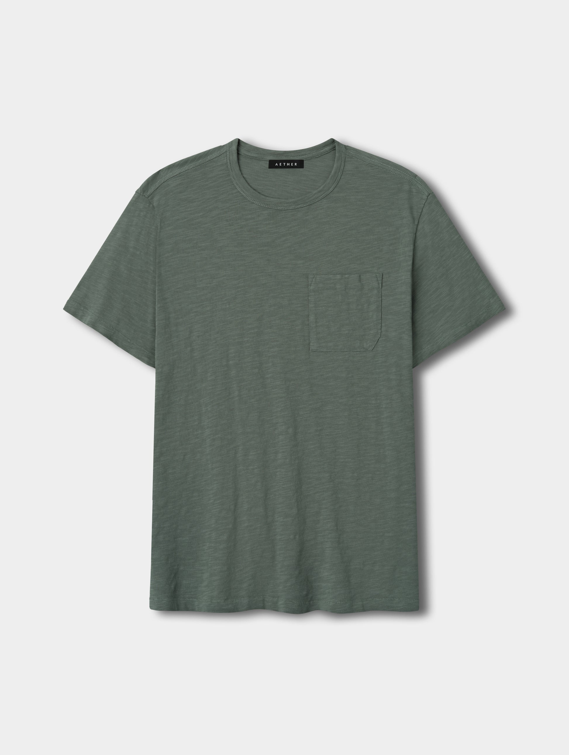 Flat lay view of the Slub Pocket Tee 2.0 in Gunmetal from AETHER Apparel.