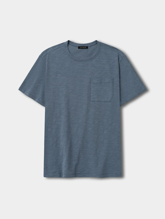 Flat lay view of the Slub Pocket Tee 2.0 in Portal Blue from AETHER Apparel.