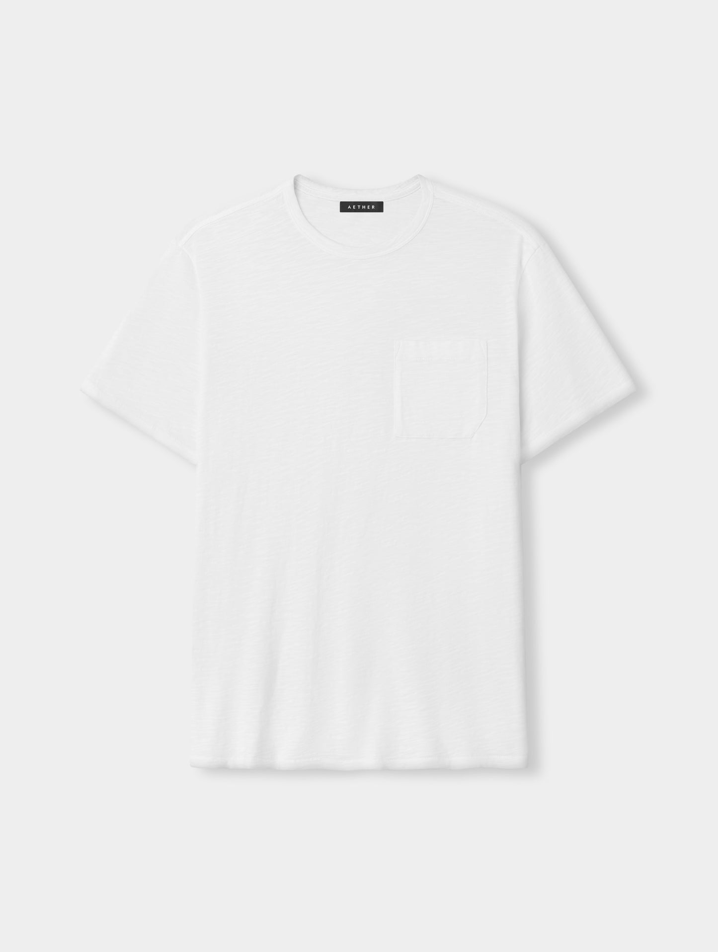 Flat lay view of the Slub Pocket Tee 2.0 in White from AETHER Apparel.