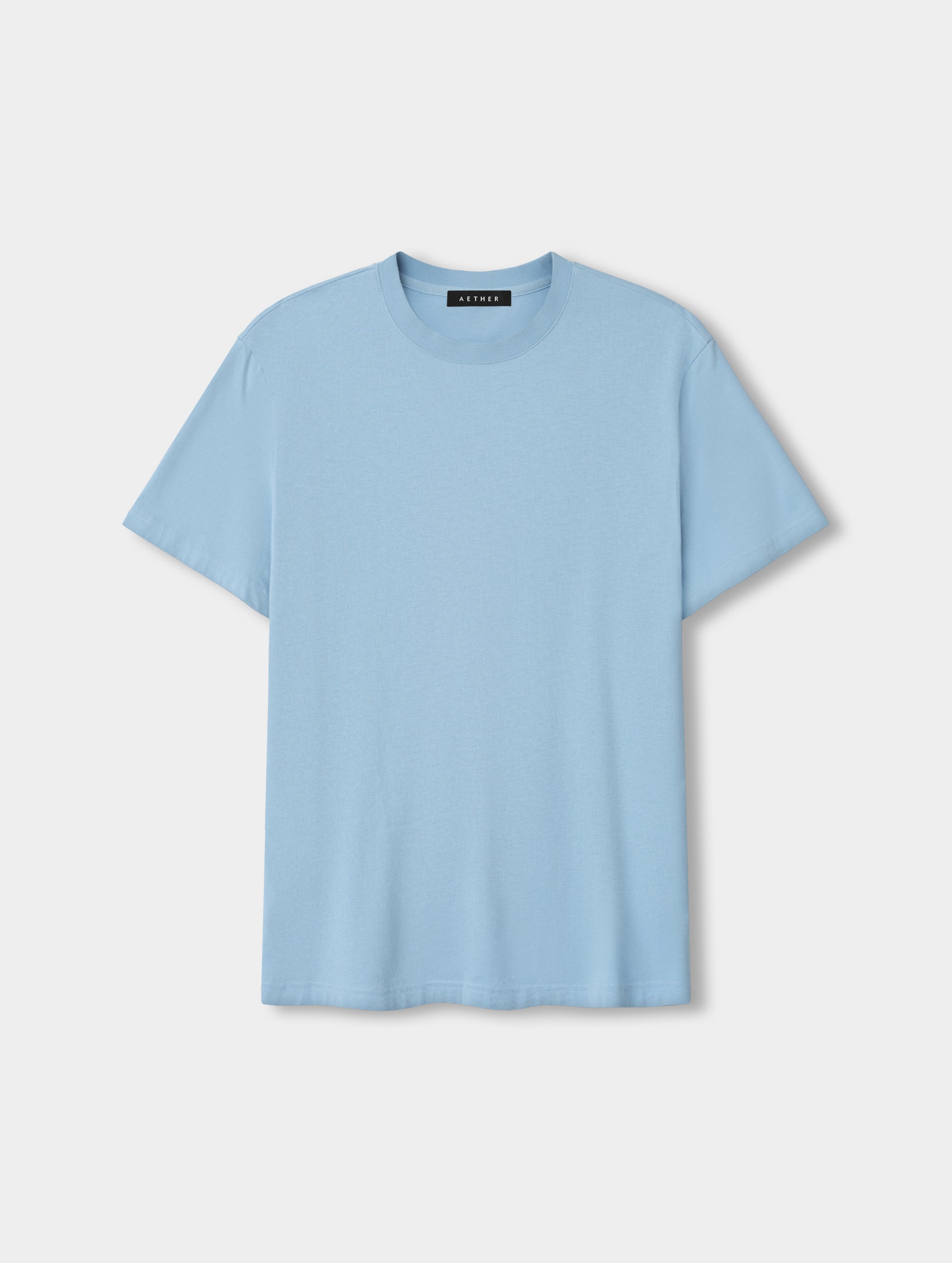 Flat lay view of the Standard Tee in Cloud Blue from AETHER Apparel.