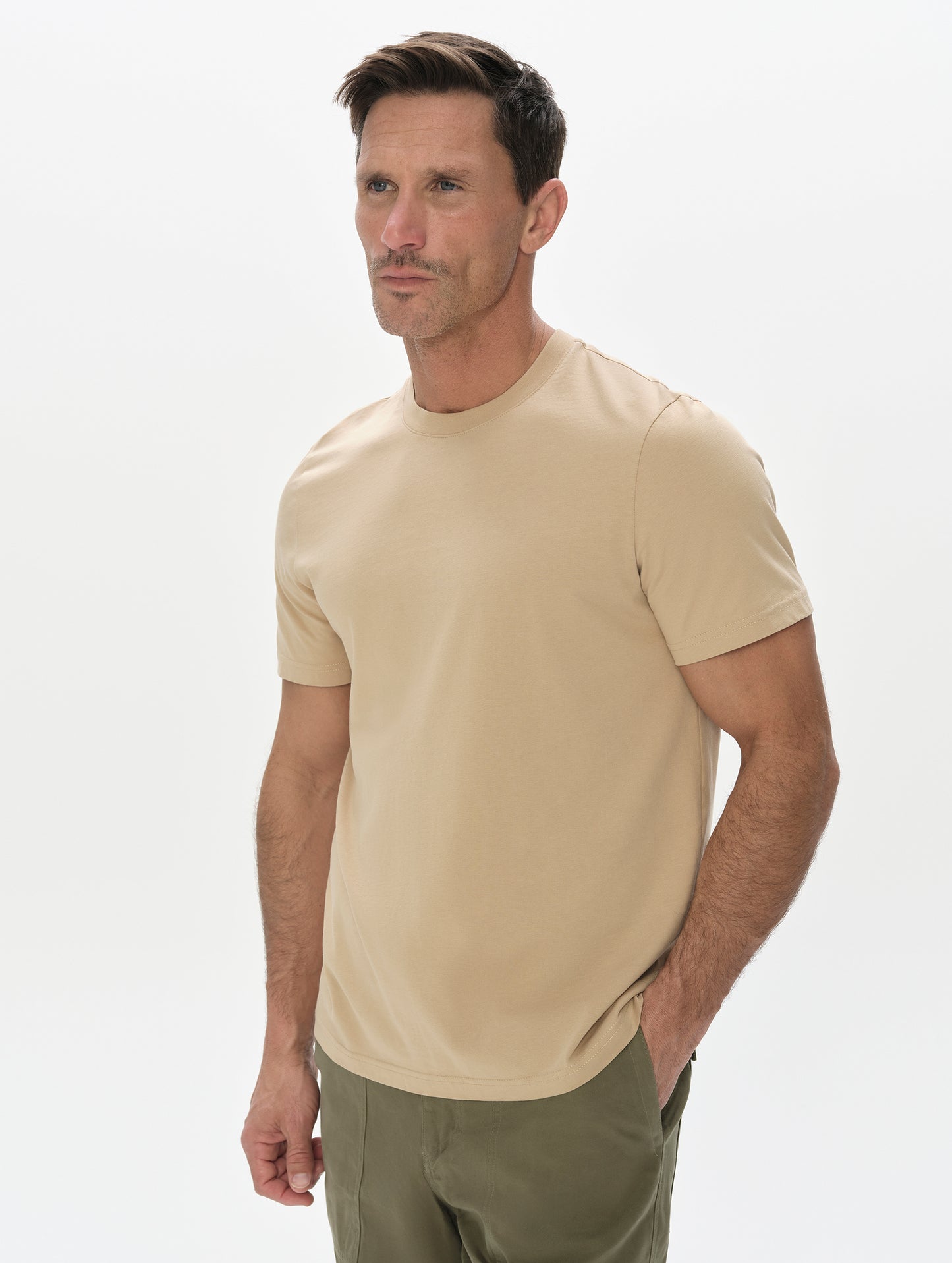 Flat lay view of the Standard Tee in Desert Tan from AETHER Apparel.