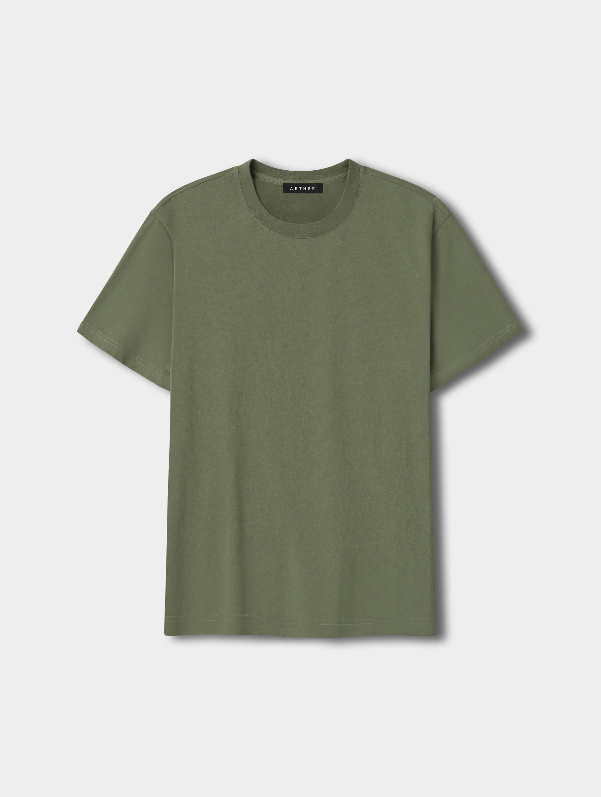 Flat lay view of the Standard Tee in Fern Green from AETHER Apparel.