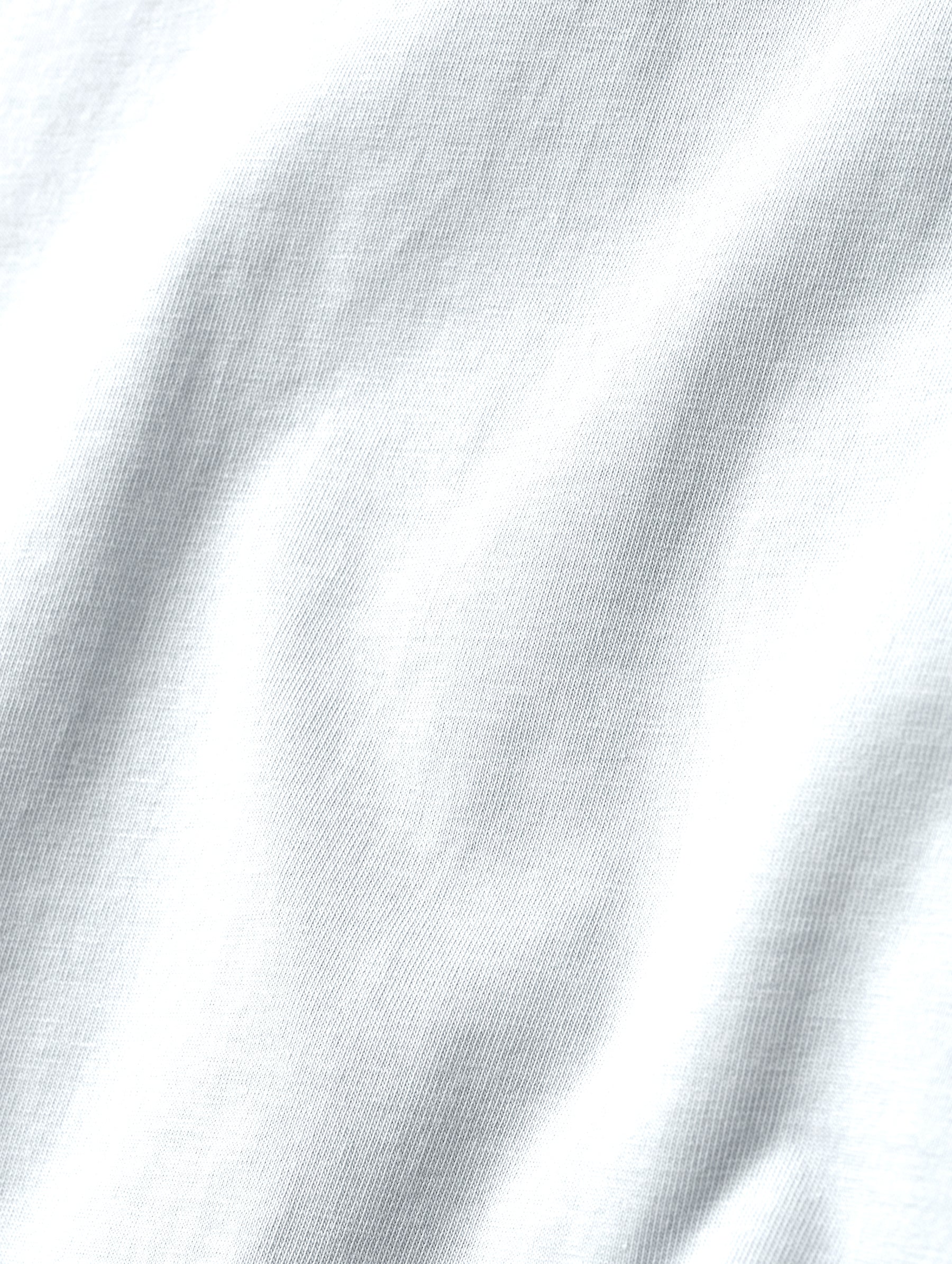 Closeup detailed view of the fabric on the Standard Tee in White from AETHER Apparel.