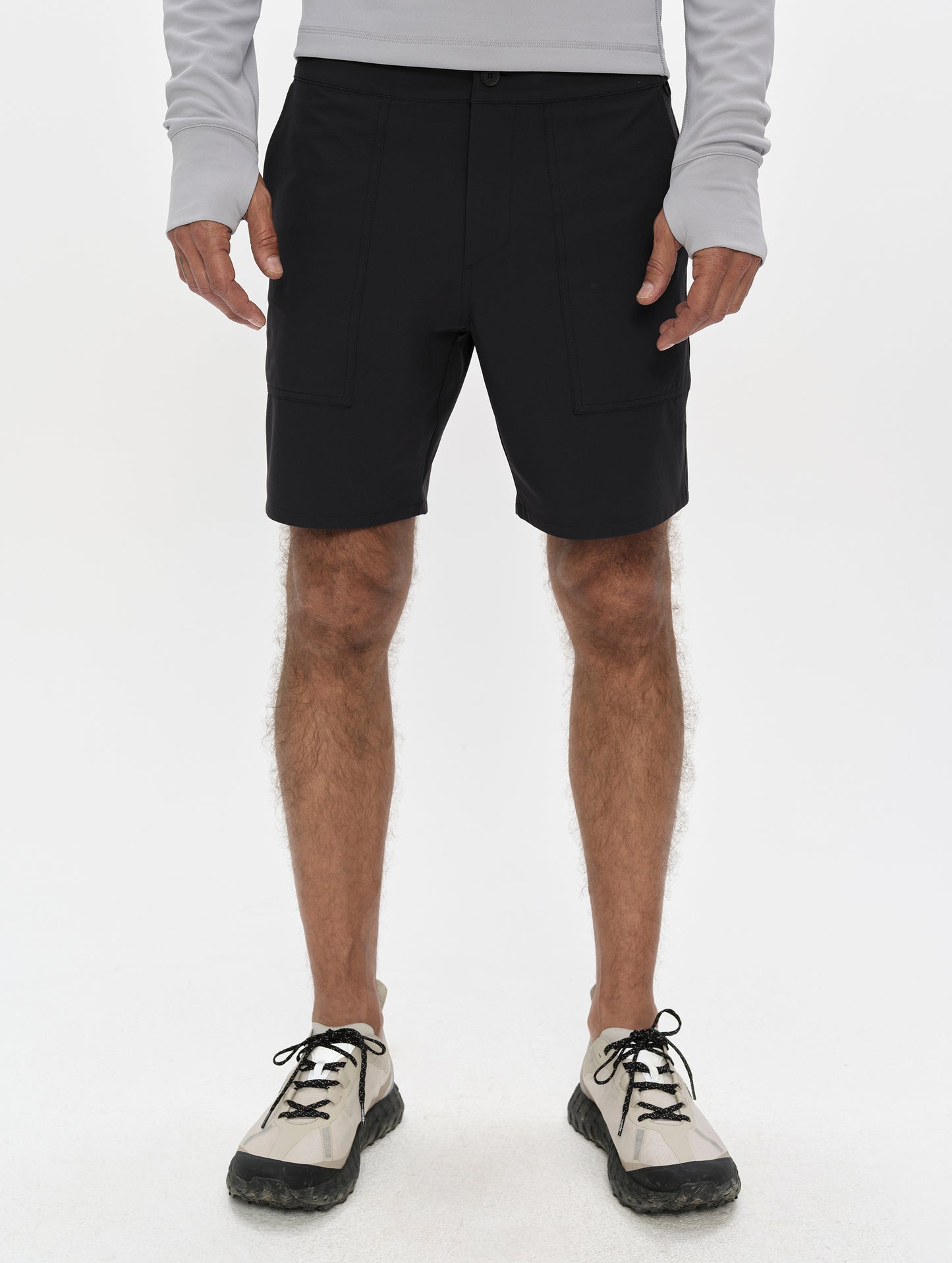 Front, lower-body view of man wearing the Velo Short in Onyx Black from AETHER Apparel.