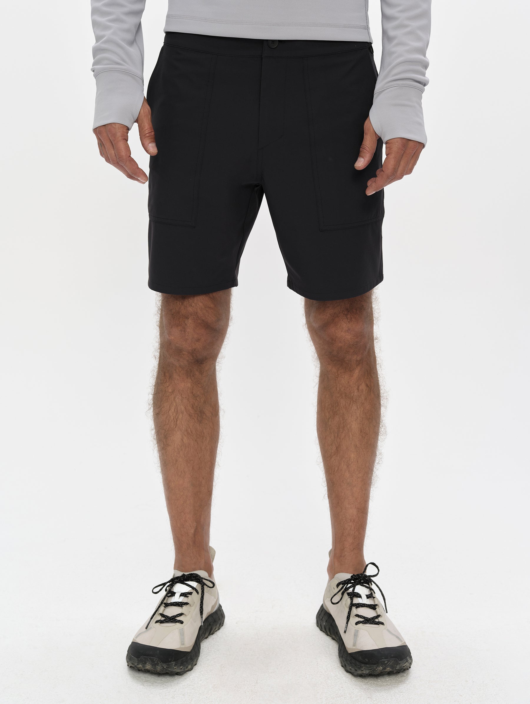 Front, lower-body view of man wearing the Velo Short in Onyx Black from AETHER Apparel.
