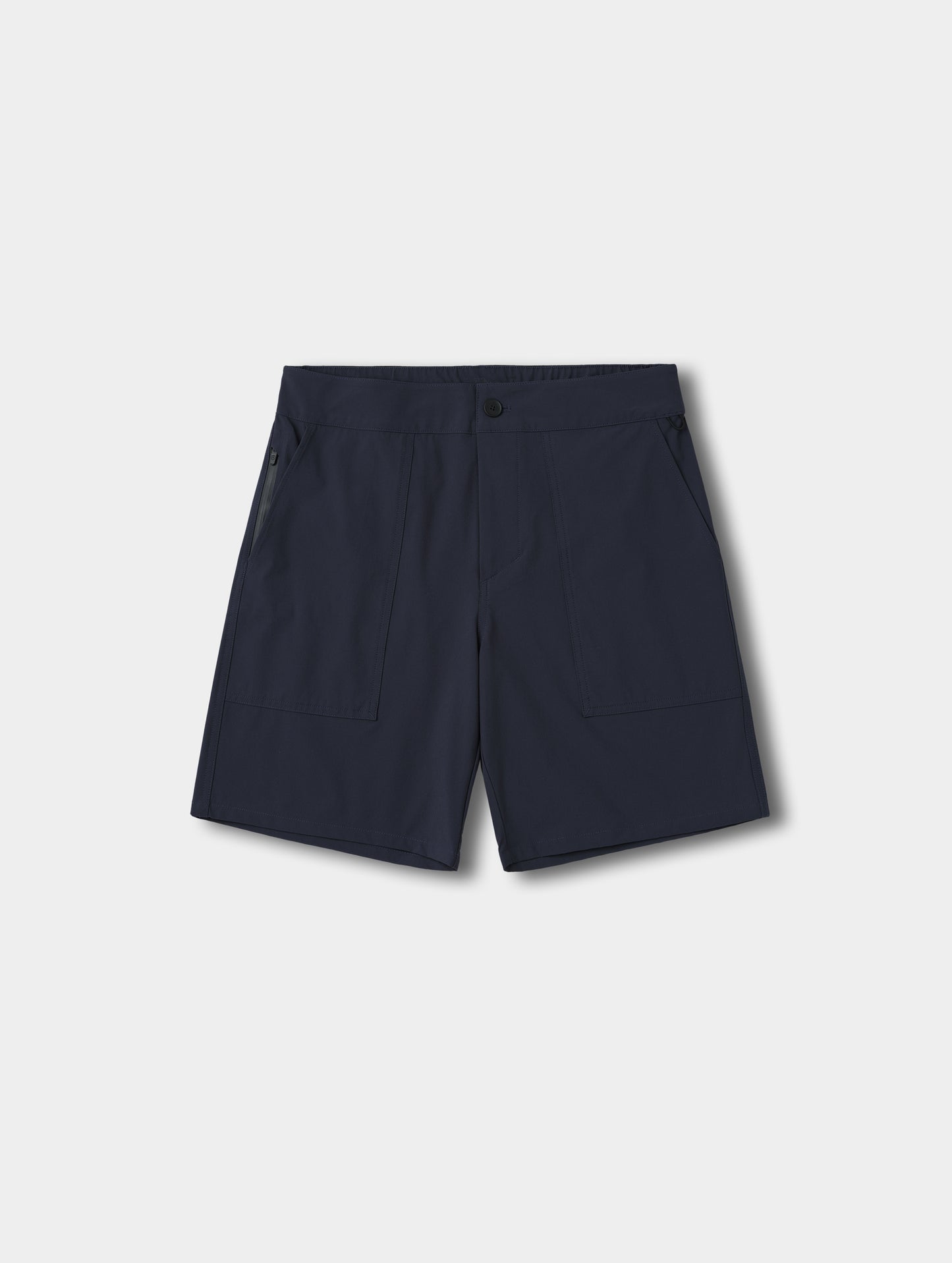 Flat lay view of the Velo Short in Total Eclipse dark blue from AETHER Apparel.