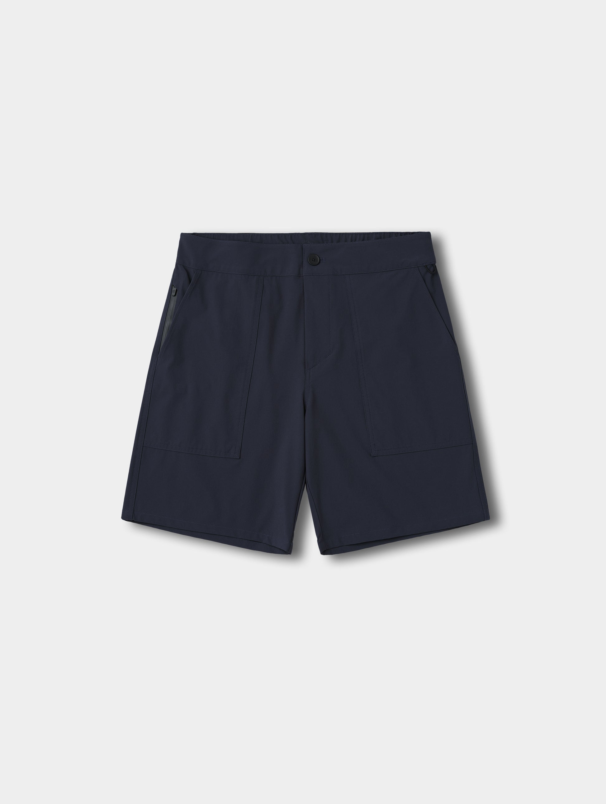 Flat lay view of the Velo Short in Total Eclipse dark blue from AETHER Apparel.