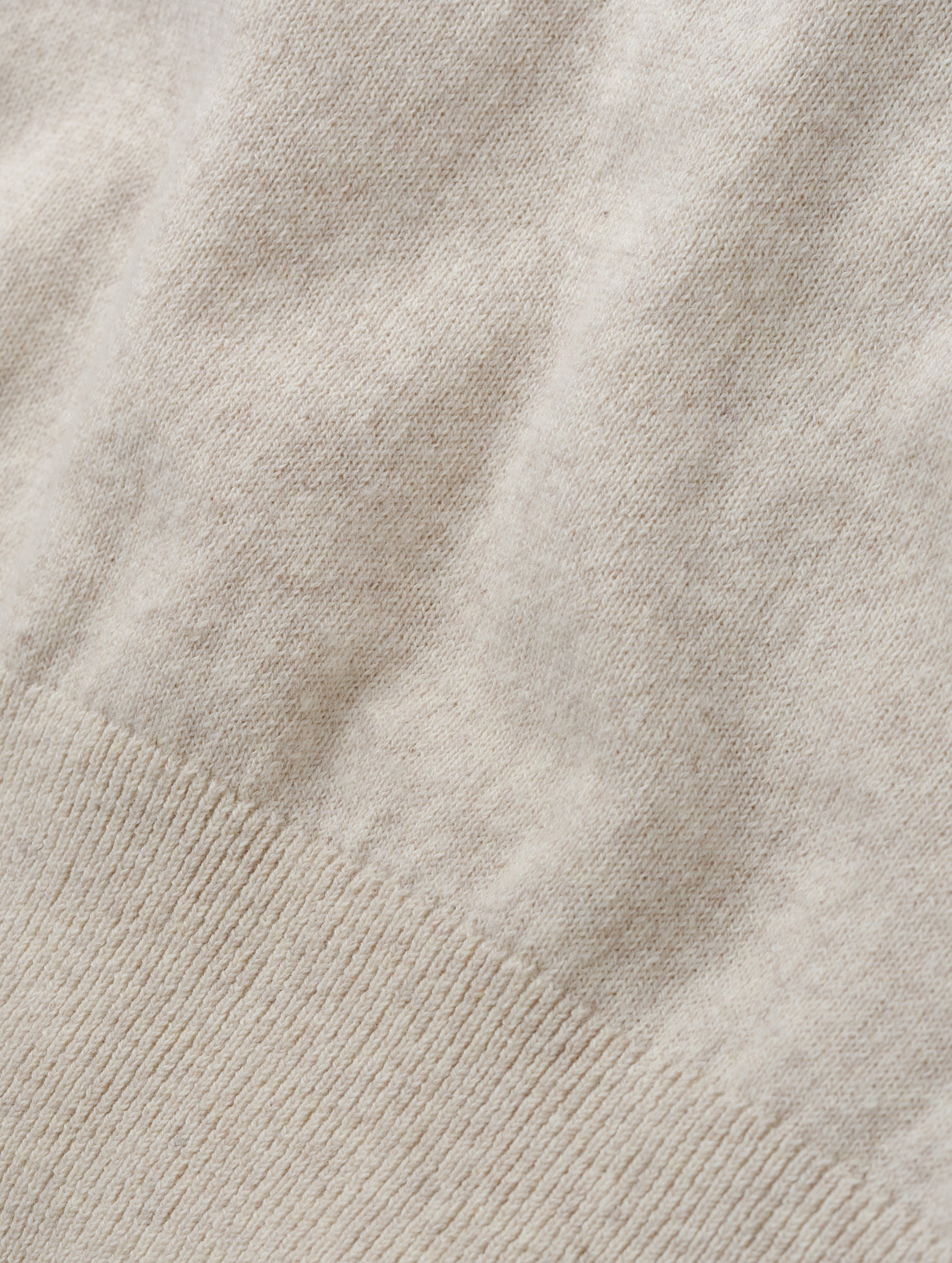 Closeup detailed view of the fabric on the women's Aero Crewneck Sweater 2.0 in Lino Tan from AETHER Apparel.