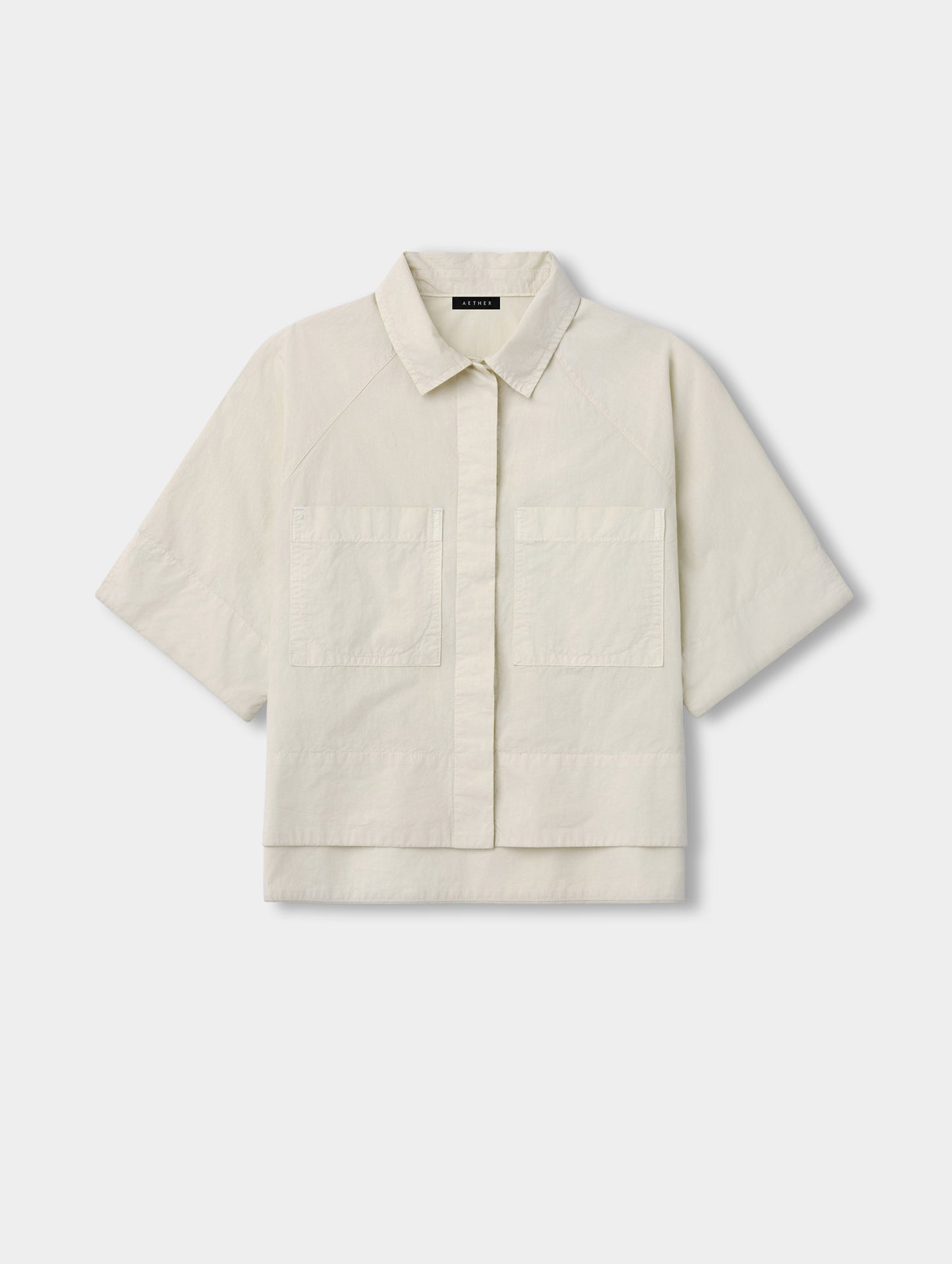 Flat lay view of the Alice Shirt in Bone from AETHER Apparel.