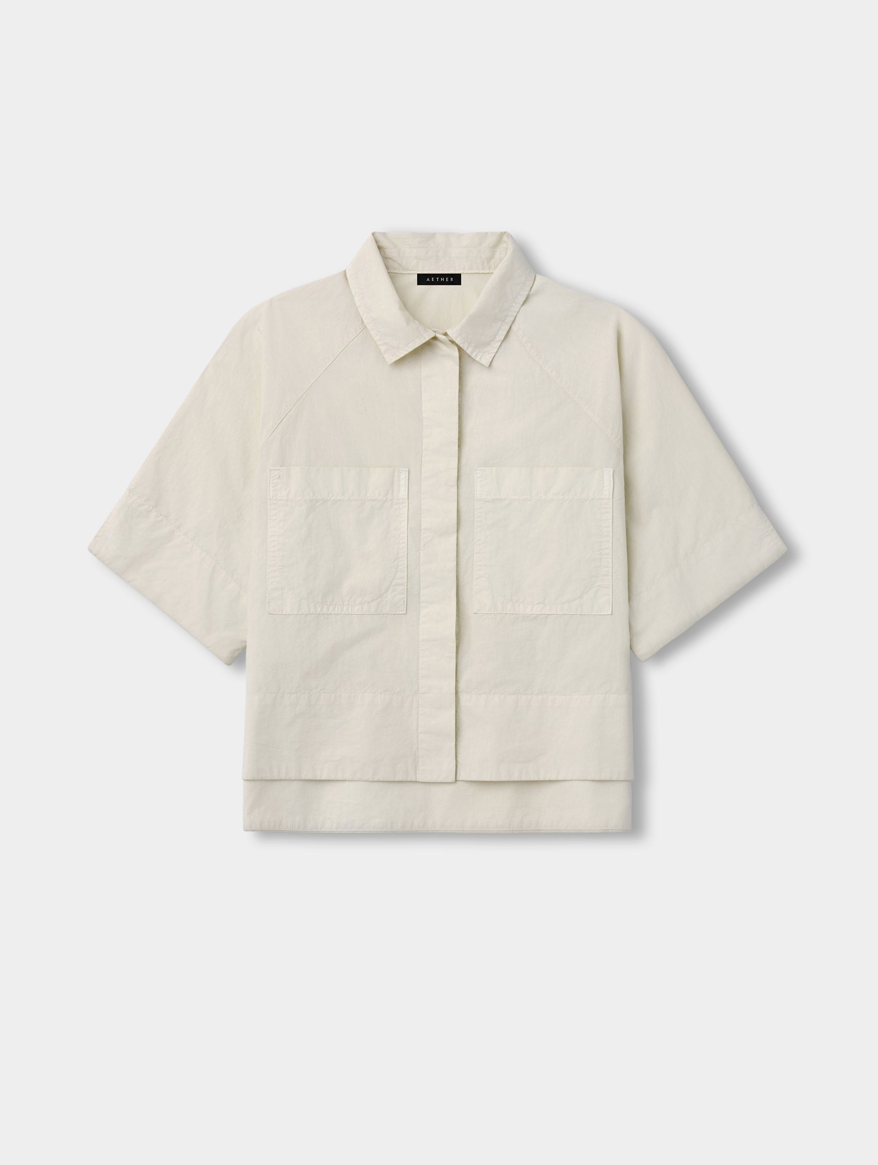 Flat lay view of the Alice Shirt in Bone from AETHER Apparel.
