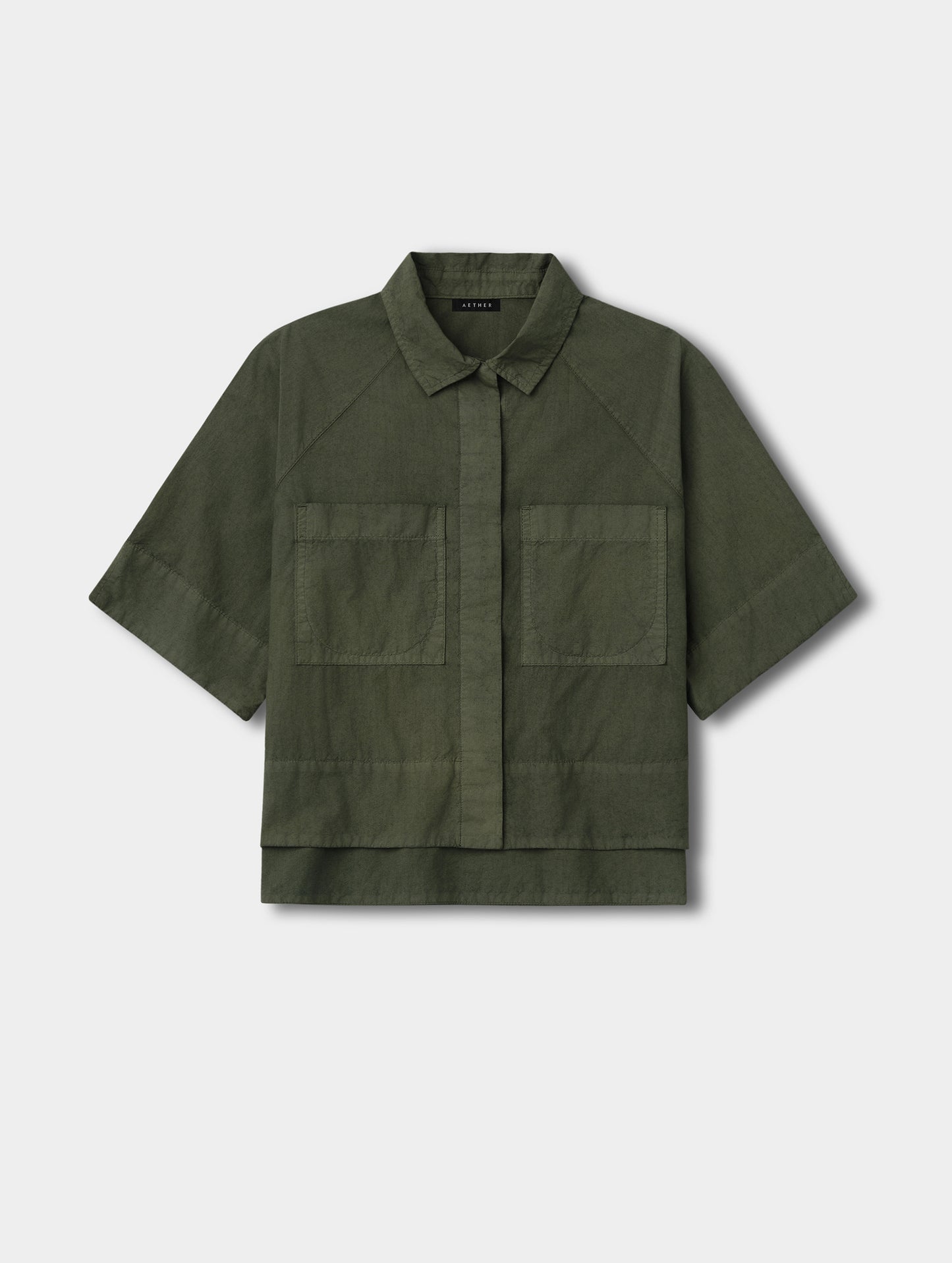 Flat lay view of the Alice Shirt in Forest Green from AETHER Apparel.
