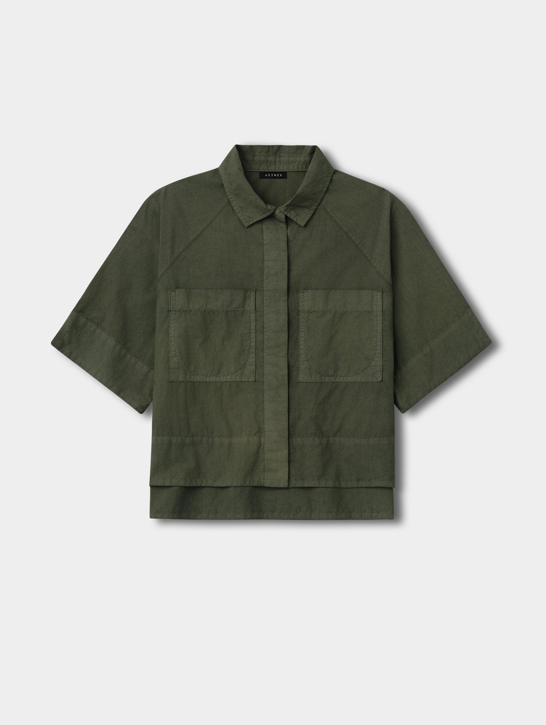 Flat lay view of the Alice Shirt in Forest Green from AETHER Apparel.