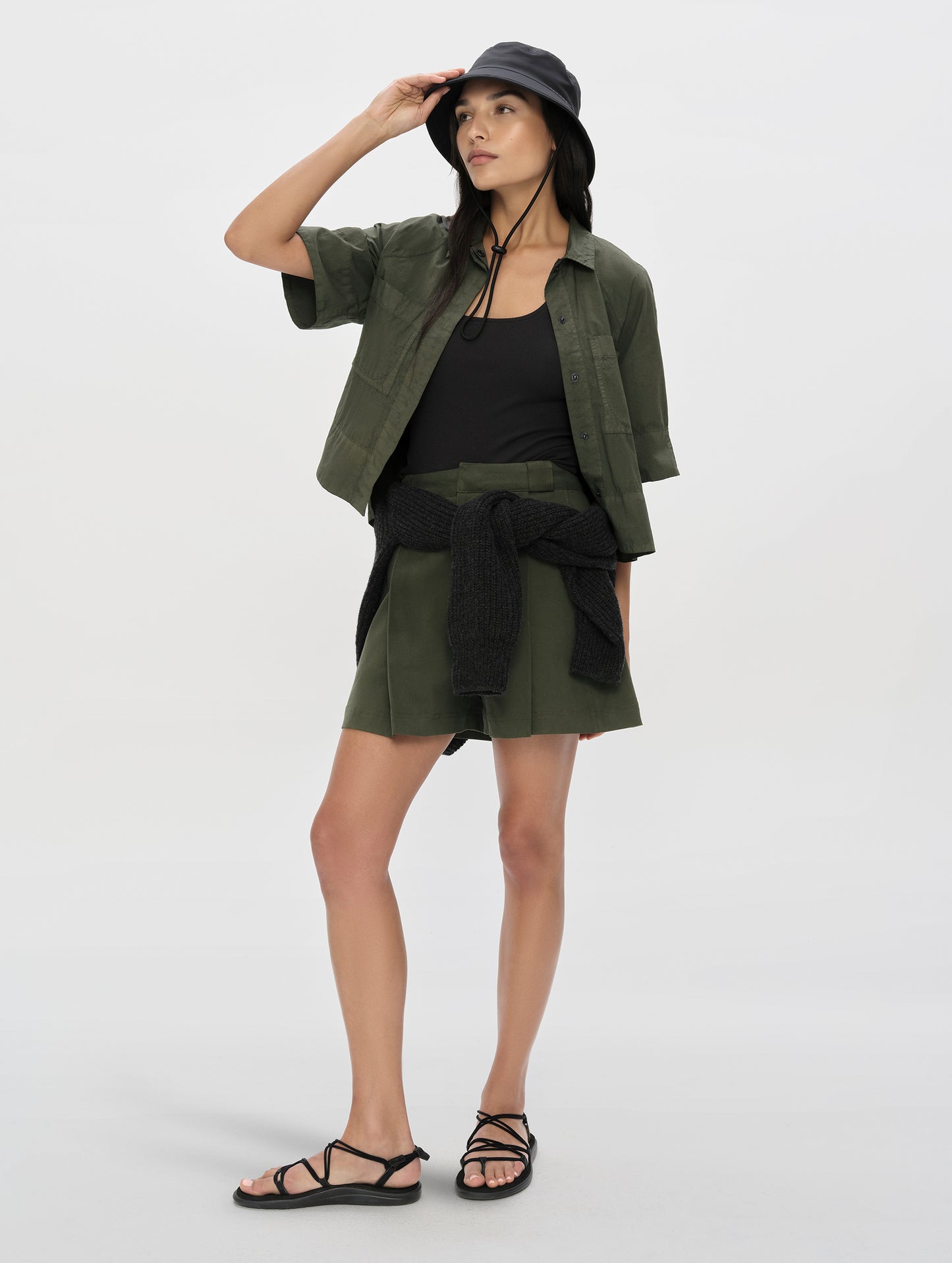 Front full body view of woman wearing the Alice Shirt in Forest Green from AETHER Apparel.