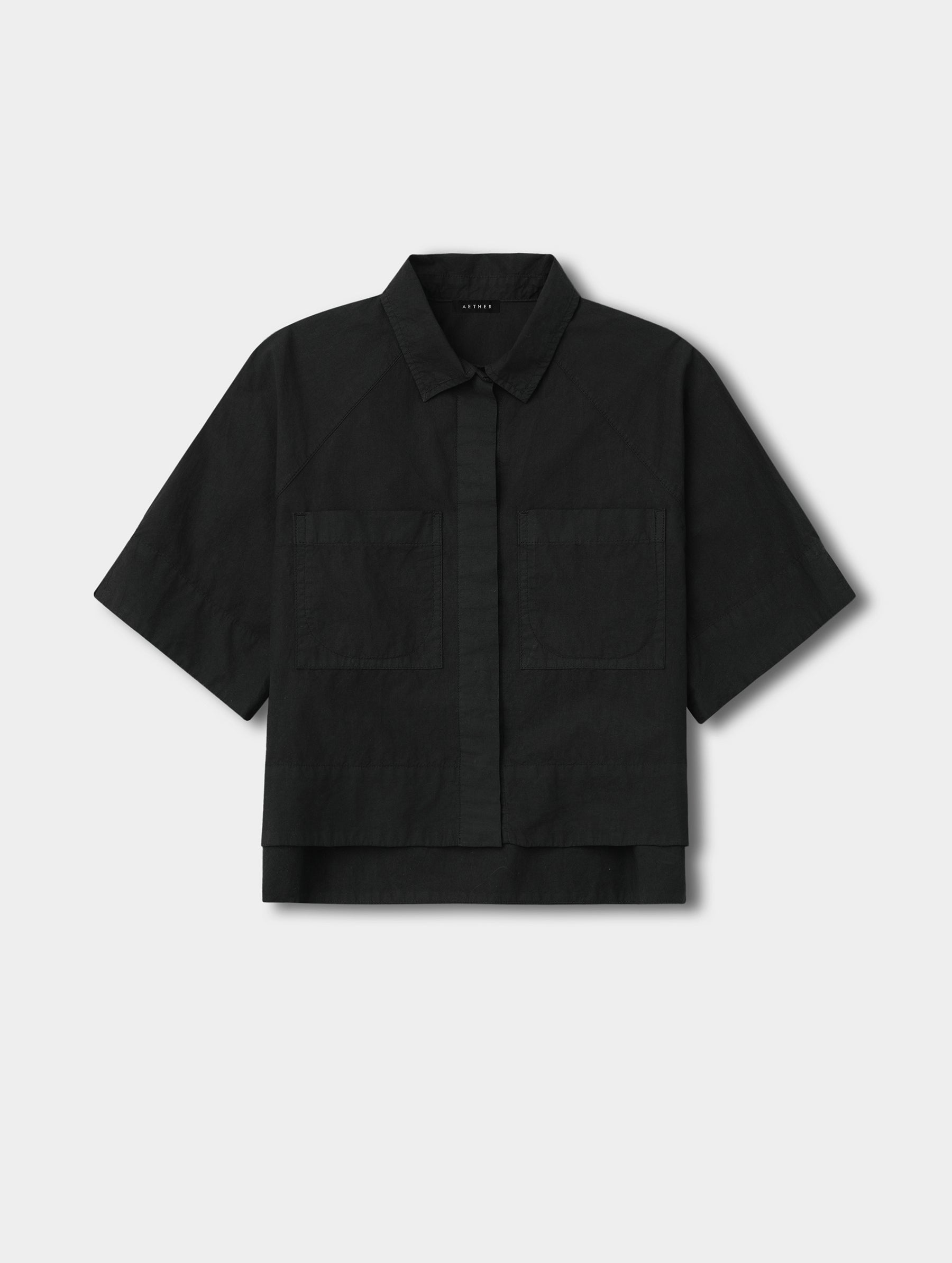 Flat lay view of the Alice Shirt in Onyx Black from AETHER Apparel.