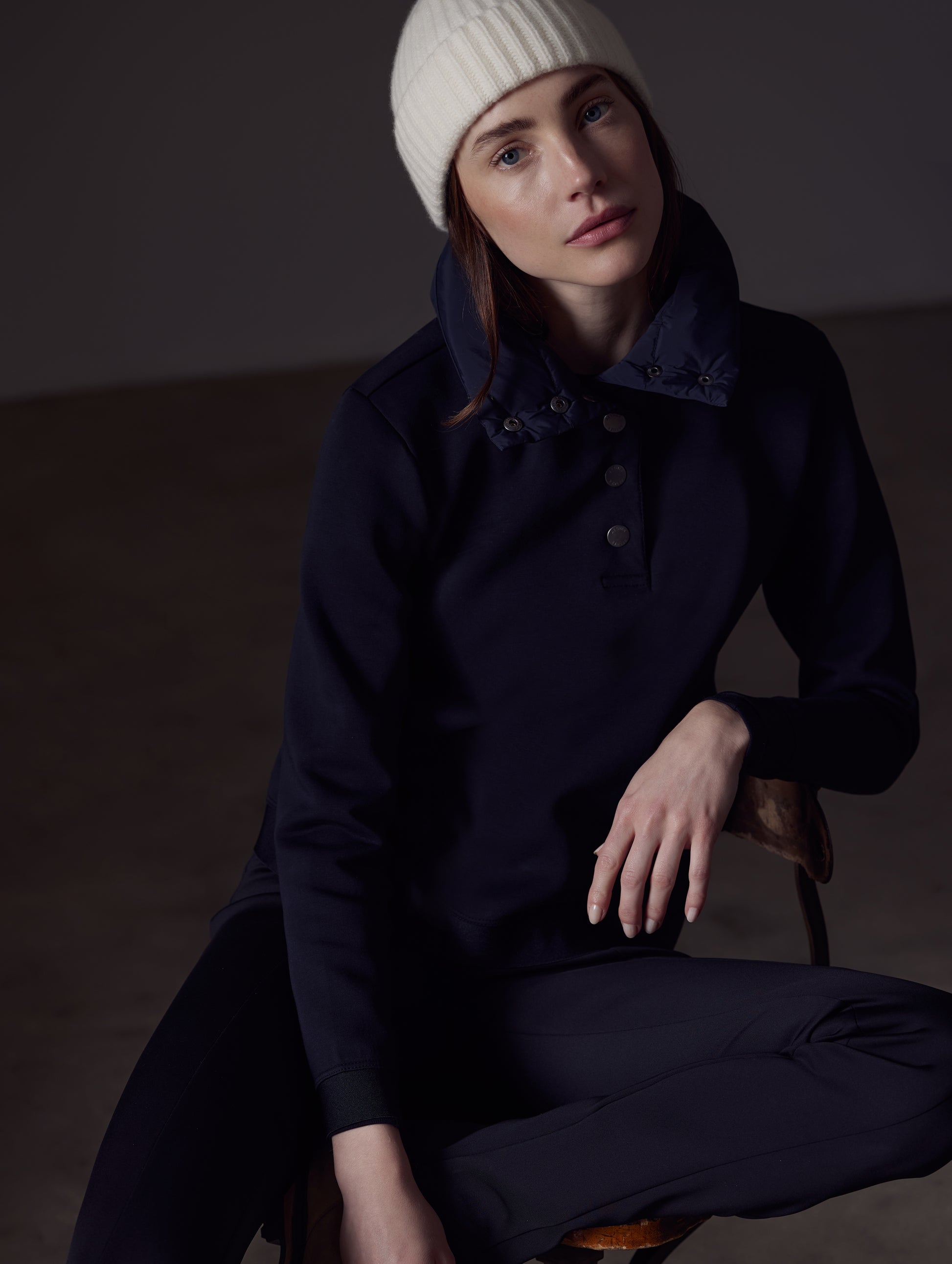 Woman wearing black Align Pullover from AETHER Apparel