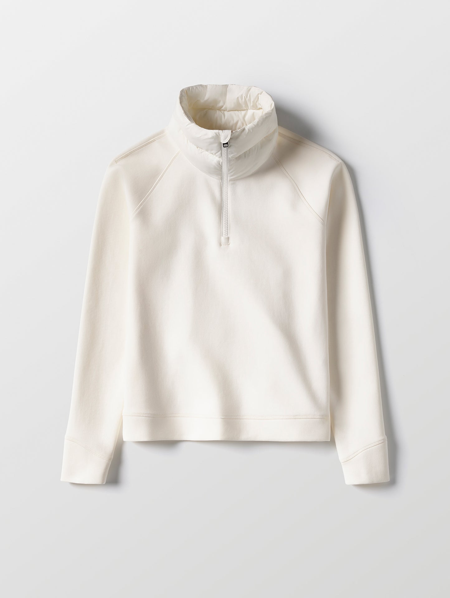 Flat lay view of the Align Half-Zip Pullover in Winter White from AETHER Apparel.