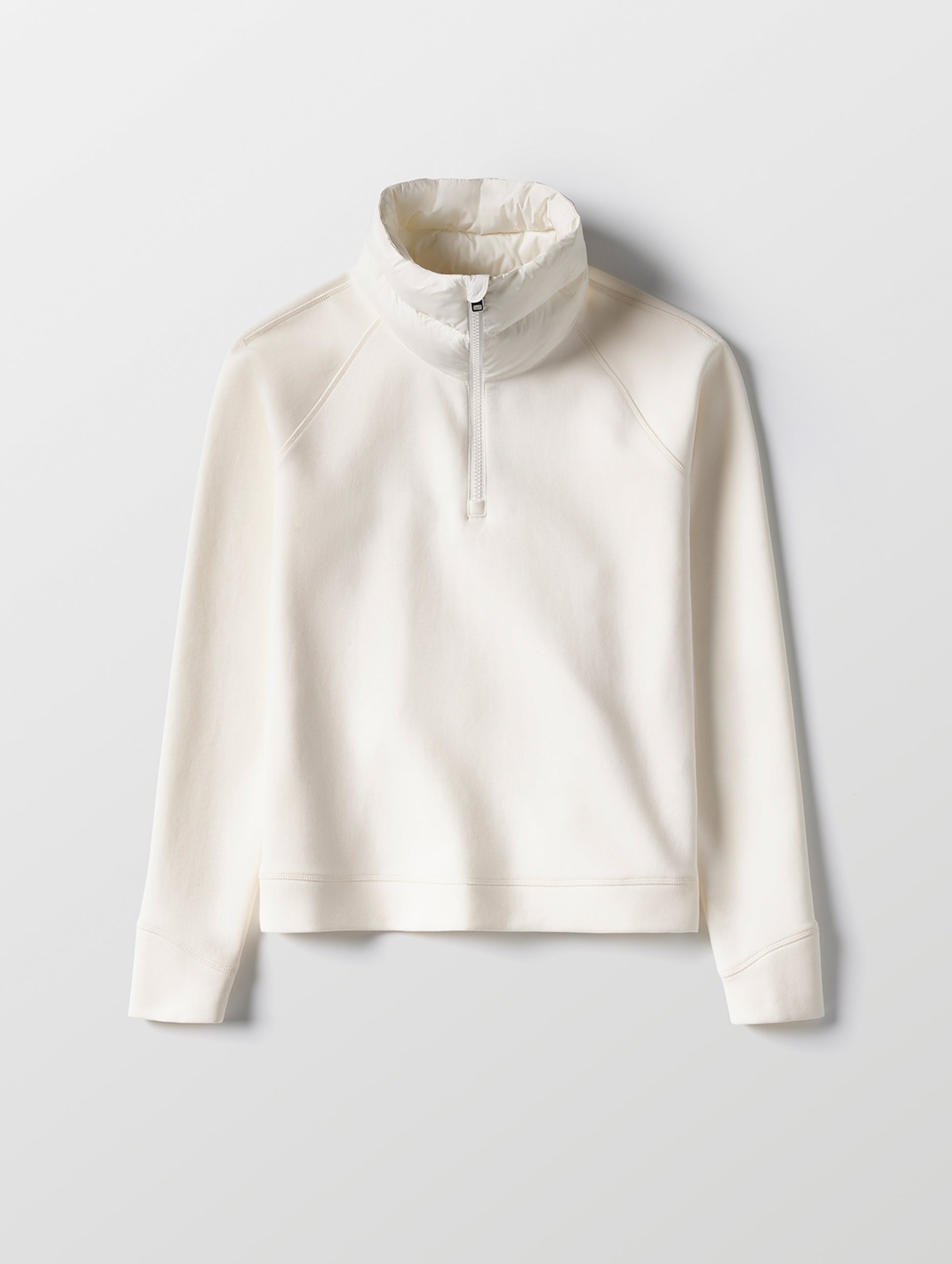 Flat lay view of the Align Half-Zip Pullover in Winter White from AETHER Apparel.