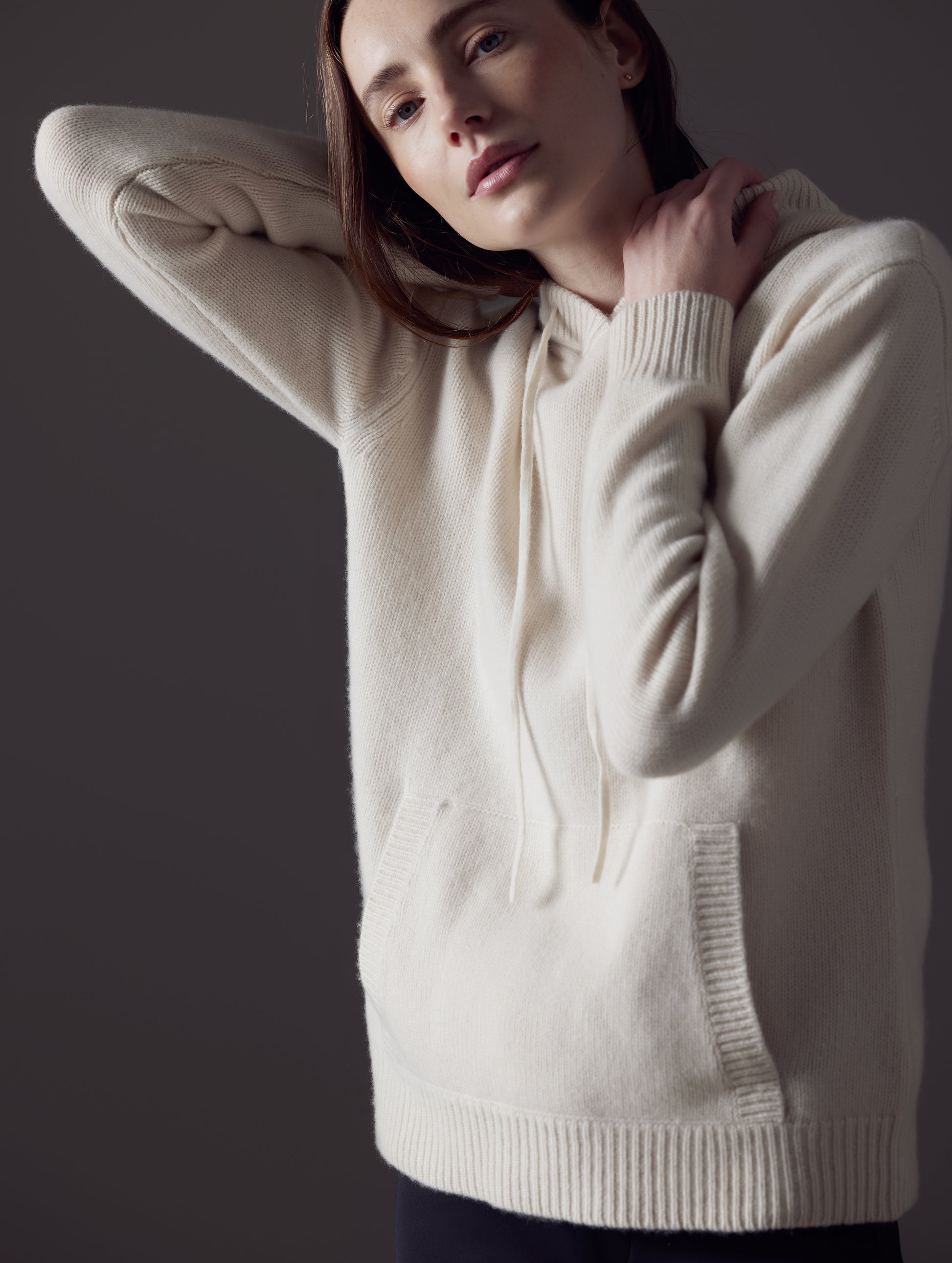 Woman wearing white Ava Cashmere Hooded Sweater