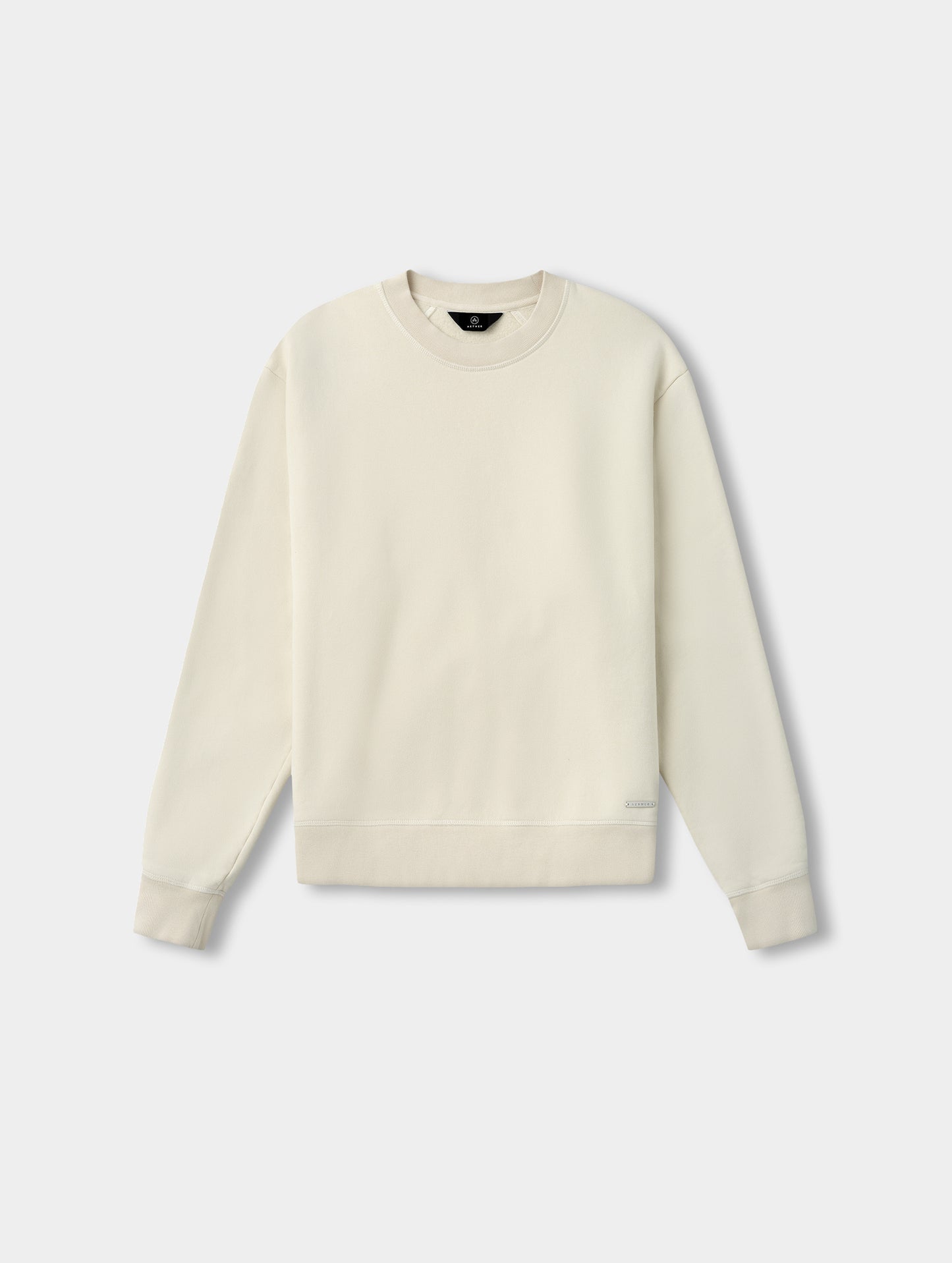 Flat lay view of the Ayla Crewneck Sweatshirt in Bone from AETHER Apparel.