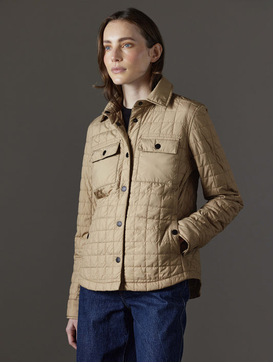 woman wearing light brown jacket from AETHER Apparel