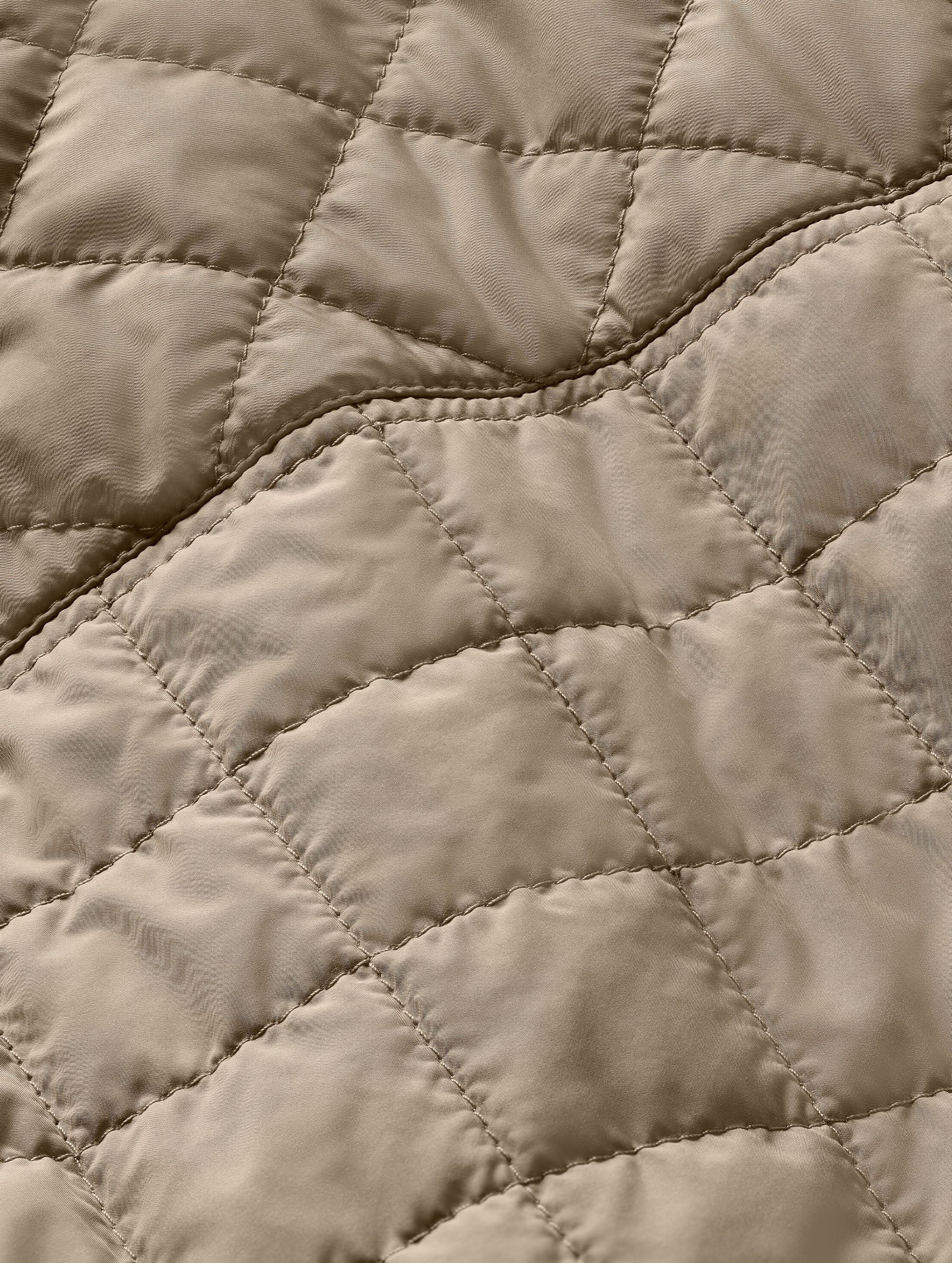 Closeup detailed view of the quilted construction on the Bardo Shirt Jacket in Chinchilla Brown from AETHER Apparel.