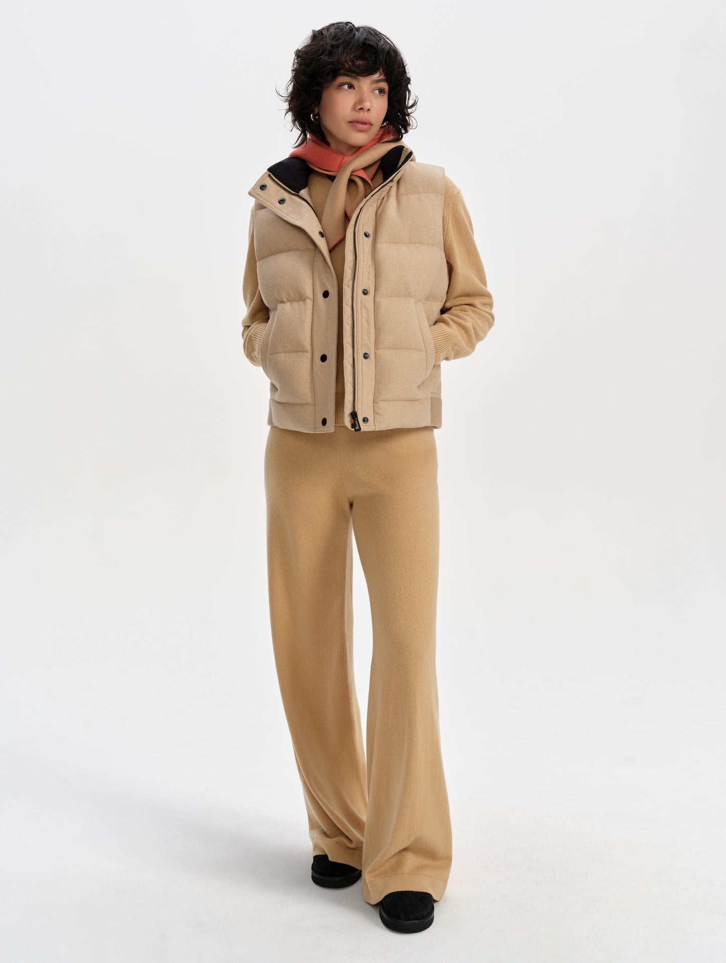 Front full-body view of woman wearing Channing Vest 2.0 in Latte Brown from AETHER Apparel.