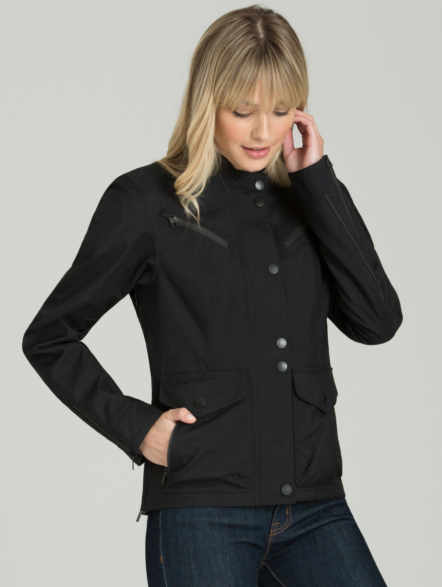 Woman wearing black Chase Motorcycle jacket from AETHER Apparel