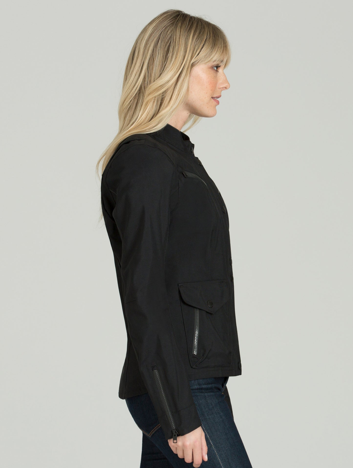Woman wearing black Chase Motorcycle jacket from AETHER Apparel
